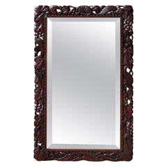 Carved Mirror Depicting Three Squirrels