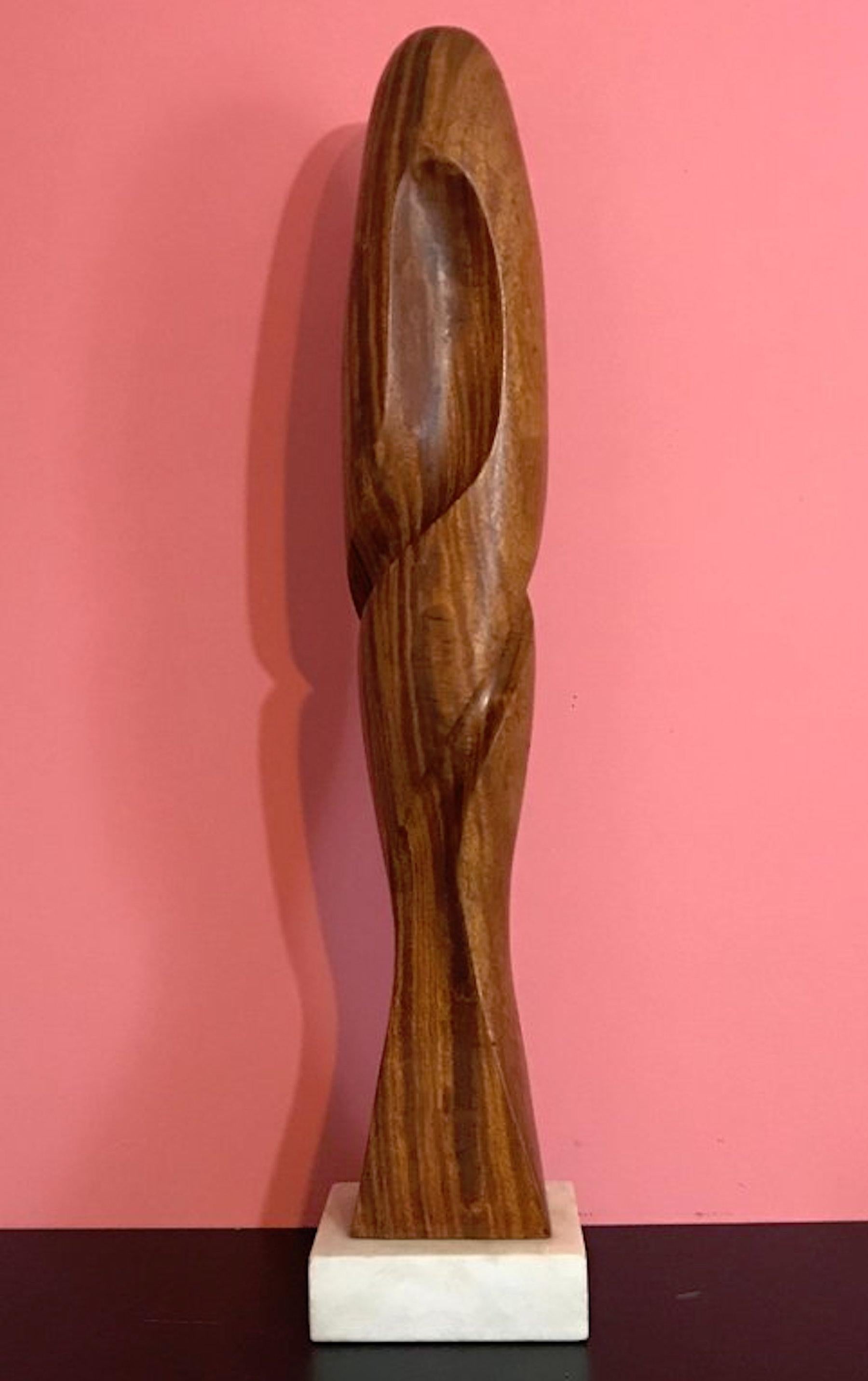 Carved modern wood sculpture, attributed to Henry Moretti, inscribed with cypher, on a 5.5