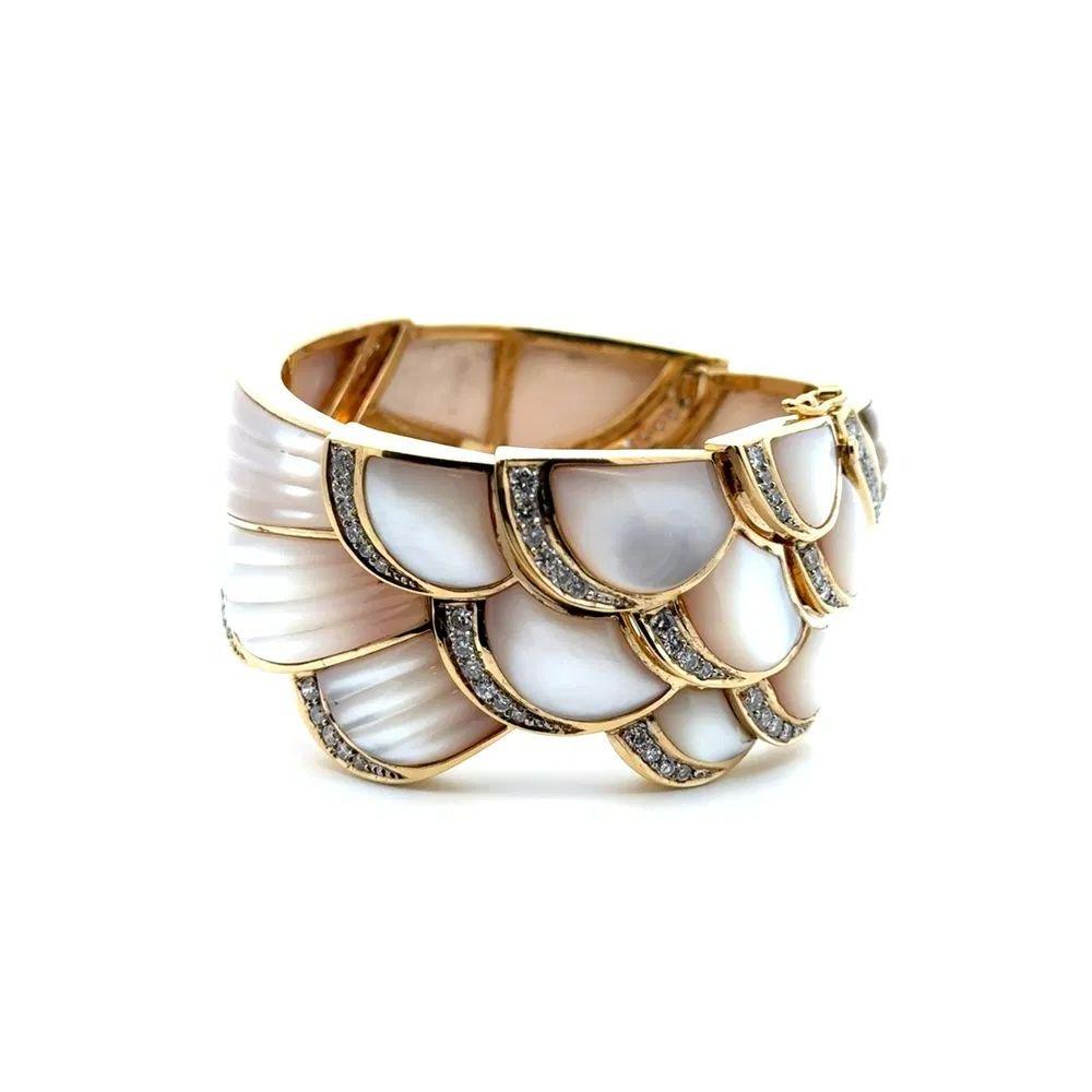 Simply Beautiful! Finely detailed Luxurious Carved MOP and Dazzling RBC Diamond Gold Oscar Worthy Vintage Bangle Cuff Bracelet. Intricately carved fluted Mother of Pearl and adorned with 3.00 total carat weight of Round Brilliant Cut Diamonds, each