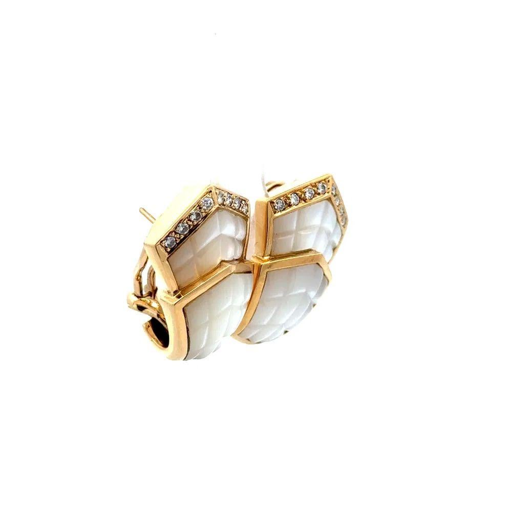 Simply Beautiful! Finely detailed Vintage 2-Tier MOP and Round Brilliant Cut Diamond Gold Clip-on Oscar Worthy Earrings. Each earring Hand set with Carved MOP and accented with RBC Diamonds, weighing approx. 0.32tcw. for both. Hand crafted in