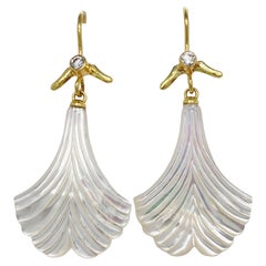 Carved Mother of Pearl earring with Fishtail Design w/ Diamonds by K. Ataumbi
