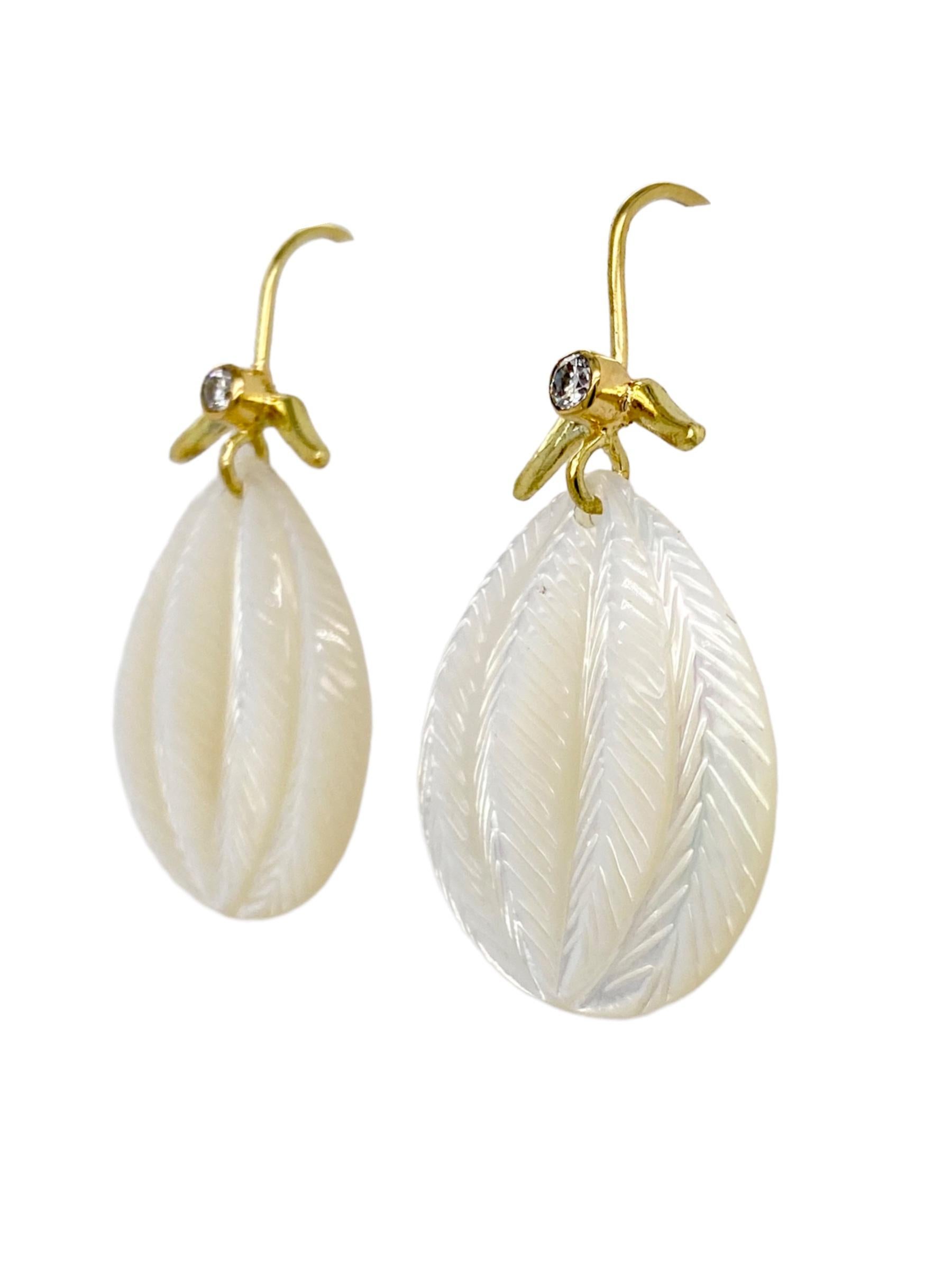 Hand-carved Mother of Pearl earrings with 18k yellow gold and two .10ct diamonds.
Inspired by my recent sailing travels.
“The purpose of jewelry is not just for adornment. There’s information in it and it changes you when you put it on.”
My jewelry