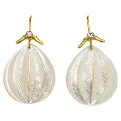 Carved Mother of Pearl earring with Sea Urchin Design w/ Diamonds by K. Ataumbi