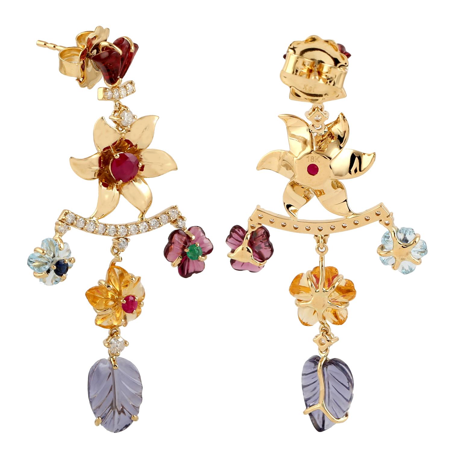 Cast in 14-karat gold. These beautiful earrings are set with 12.2 carats of carved multi gemstone, emerald, topaz, amethyst, citrine, ruby and .69 carats of sparkling diamonds.  See other flower collection matching pieces.

FOLLOW  MEGHNA JEWELS