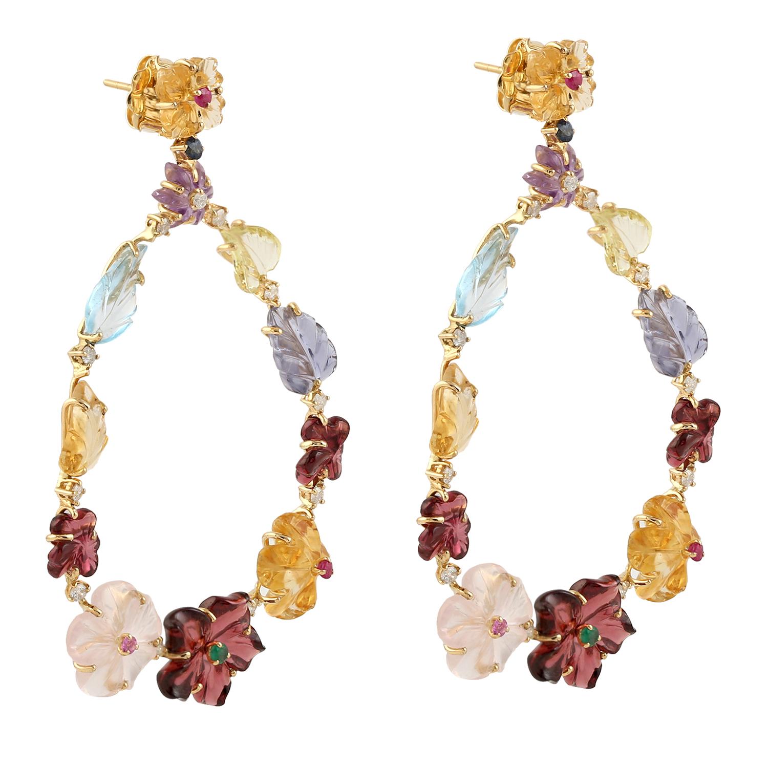 Cast in 18-karat gold. These beautiful earrings are set with 53.01 carats of carved multi gemstone, emerald, topaz, amethyst, citrine, ruby and .78 carats of sparkling diamonds.  See other flower collection matching pieces.

FOLLOW  MEGHNA JEWELS