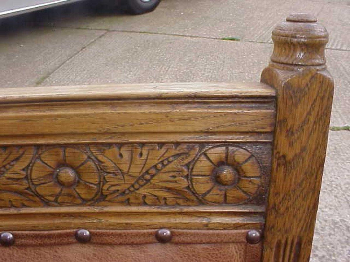 Hand-Carved E W Godwin. An Aesthetic Movement Carved Oak Armchair with Ebonized Spindles