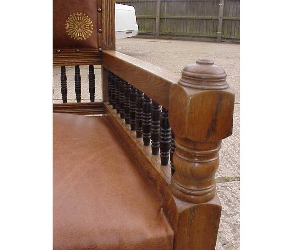 E W Godwin. An Aesthetic Movement Carved Oak Armchair with Ebonized Spindles In Good Condition In London, GB