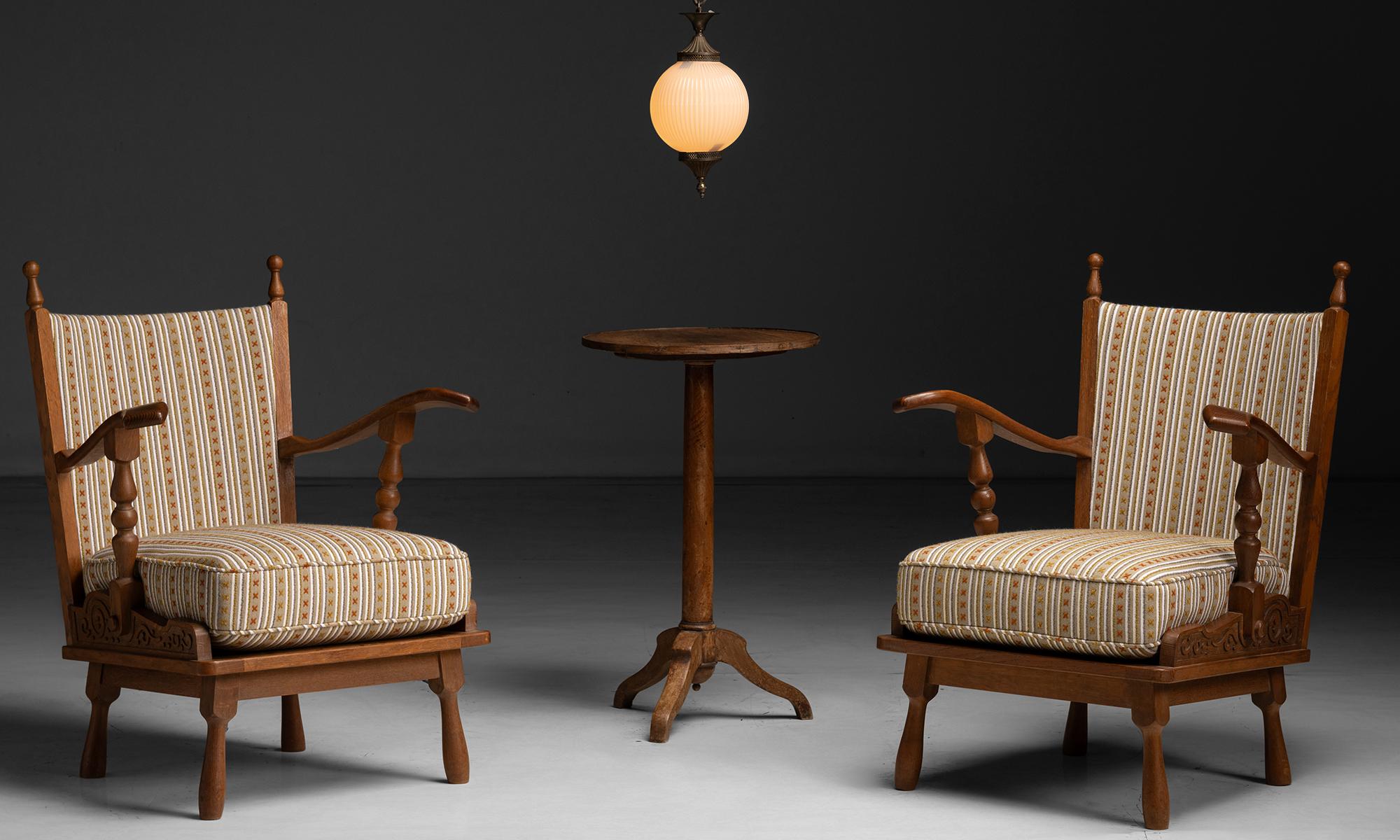 Carved Oak Armchairs in Christopher Farr Fabric

France circa 1960

Decorative relief carving on sides, with curved / turned arms. Newly upholstered in cotton blend by Christopher Farr.

27