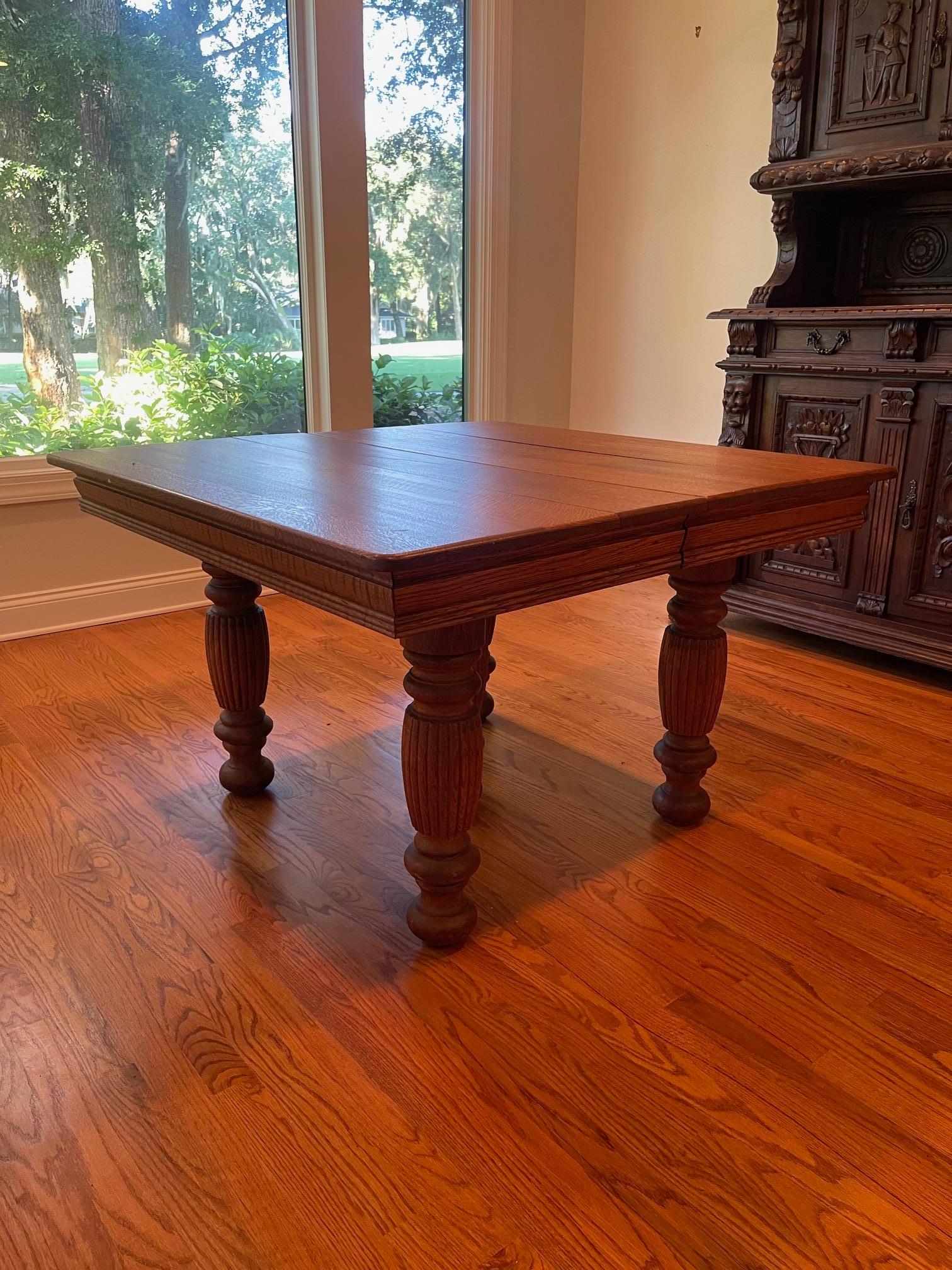 Carved Oak Arts & Crafts Art Deco French Dining Table, Mid 20th Century.  It's and expandable table, but unfortunately there are no leaves that go with this table