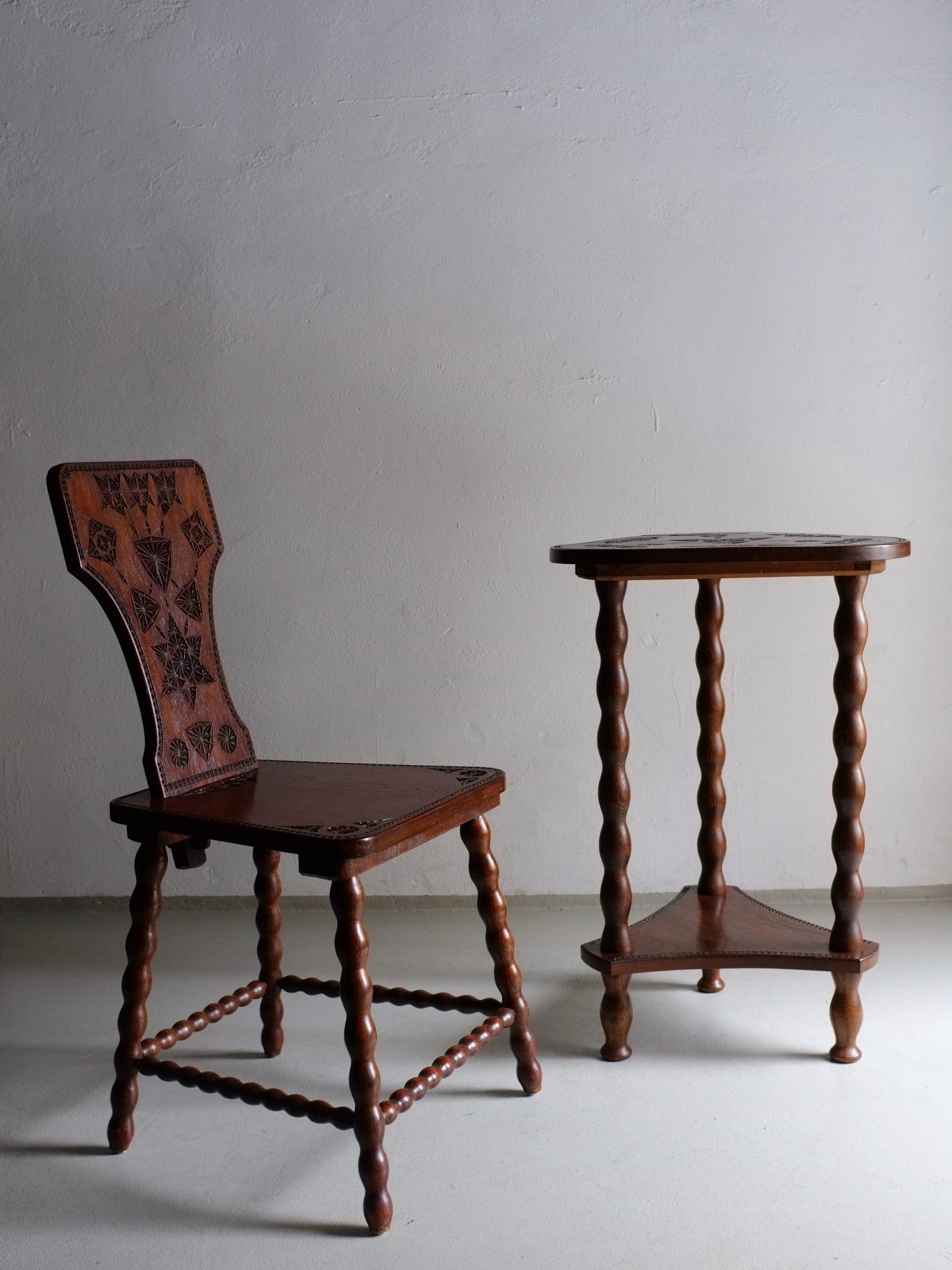 Carved oak wood chair and table set with bobbin-turned legs.
Chair: H 90 cm, H(seat) 46 cm, W 42 cm, D 45 cm
Table: H 76 cm, W 48 cm, D 48 cm.