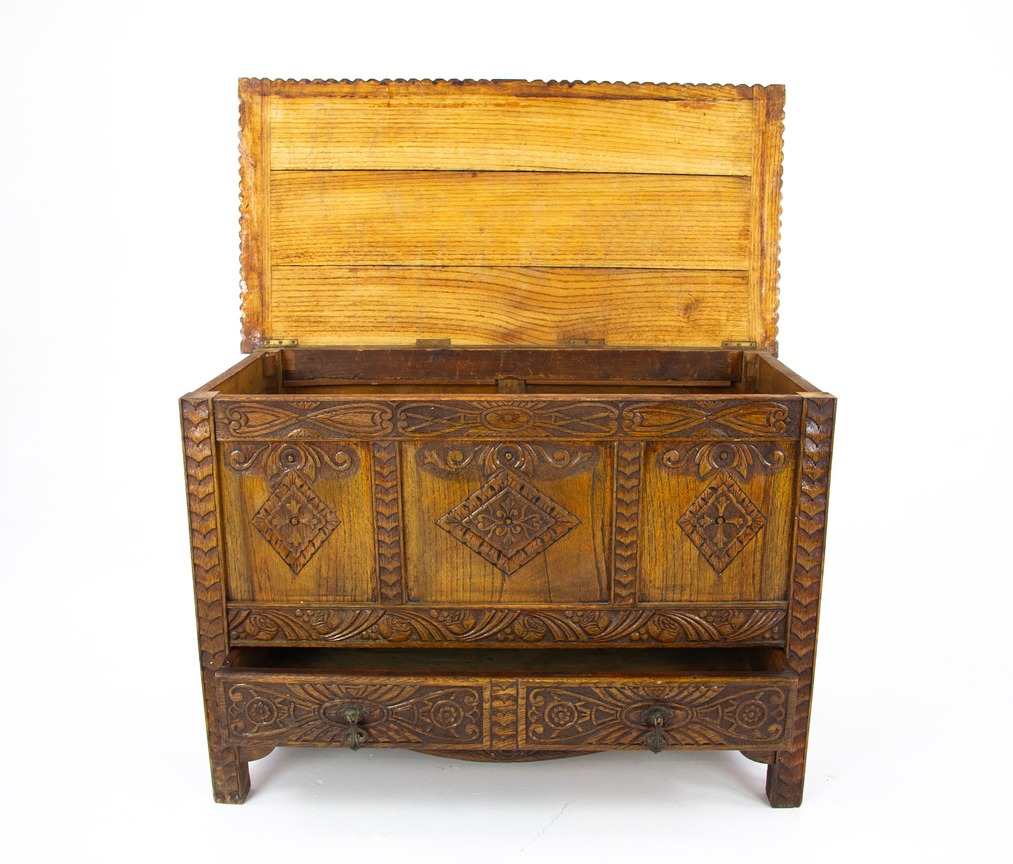 Carved oak chest, oak blanket box, carved trunk, oak coffer, Victorian chest, Scotland, 1890, Antique Furniture, B1278, 

Scotland, 1890
Solid oak construction
Lift up top with storage space interior
Heavily carved panels to the front
Carved
