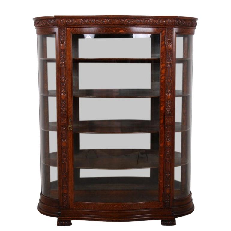 Carved Oak China Cabinet with Curved Glass