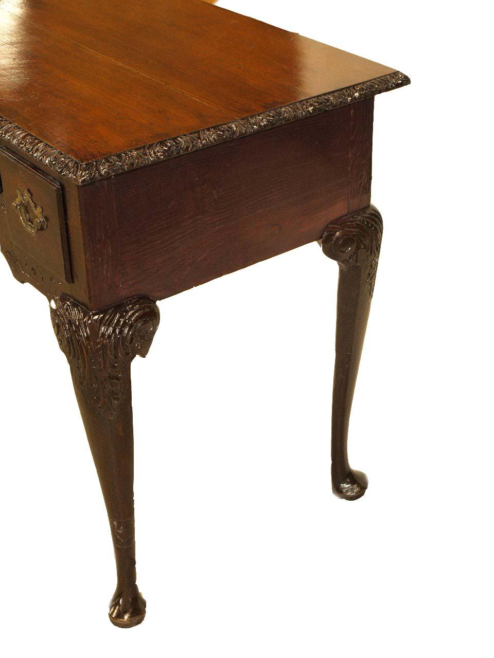 English Carved Oak Chippendale Lowboy For Sale