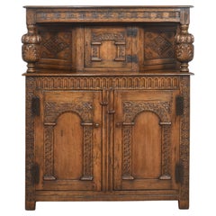 Carved oak court cupboard
