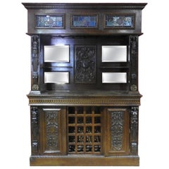 Carved Oak Figural Renaissance Style Satined Glass Dry Back Bar Wine Rack