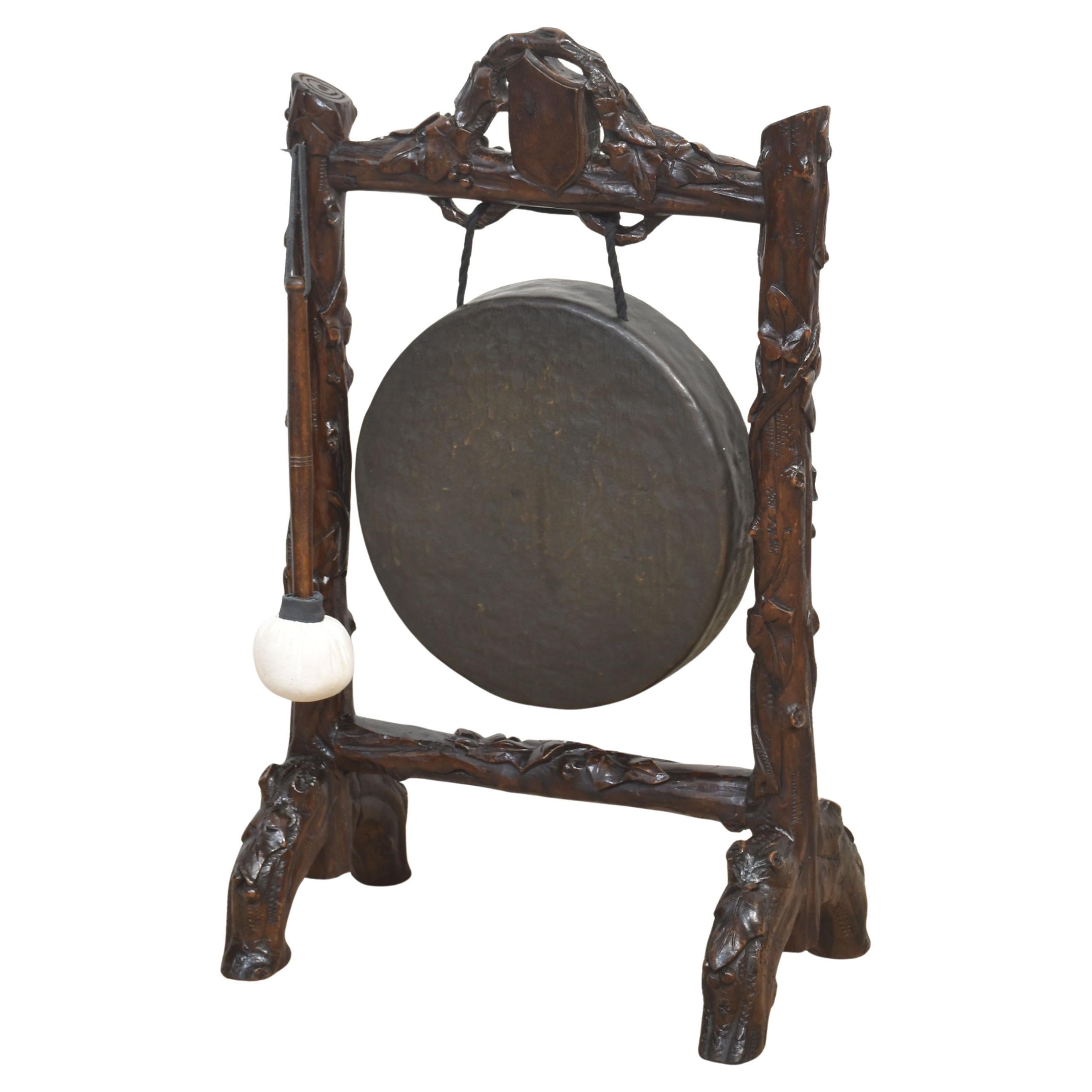 Carved oak framed dinner gong