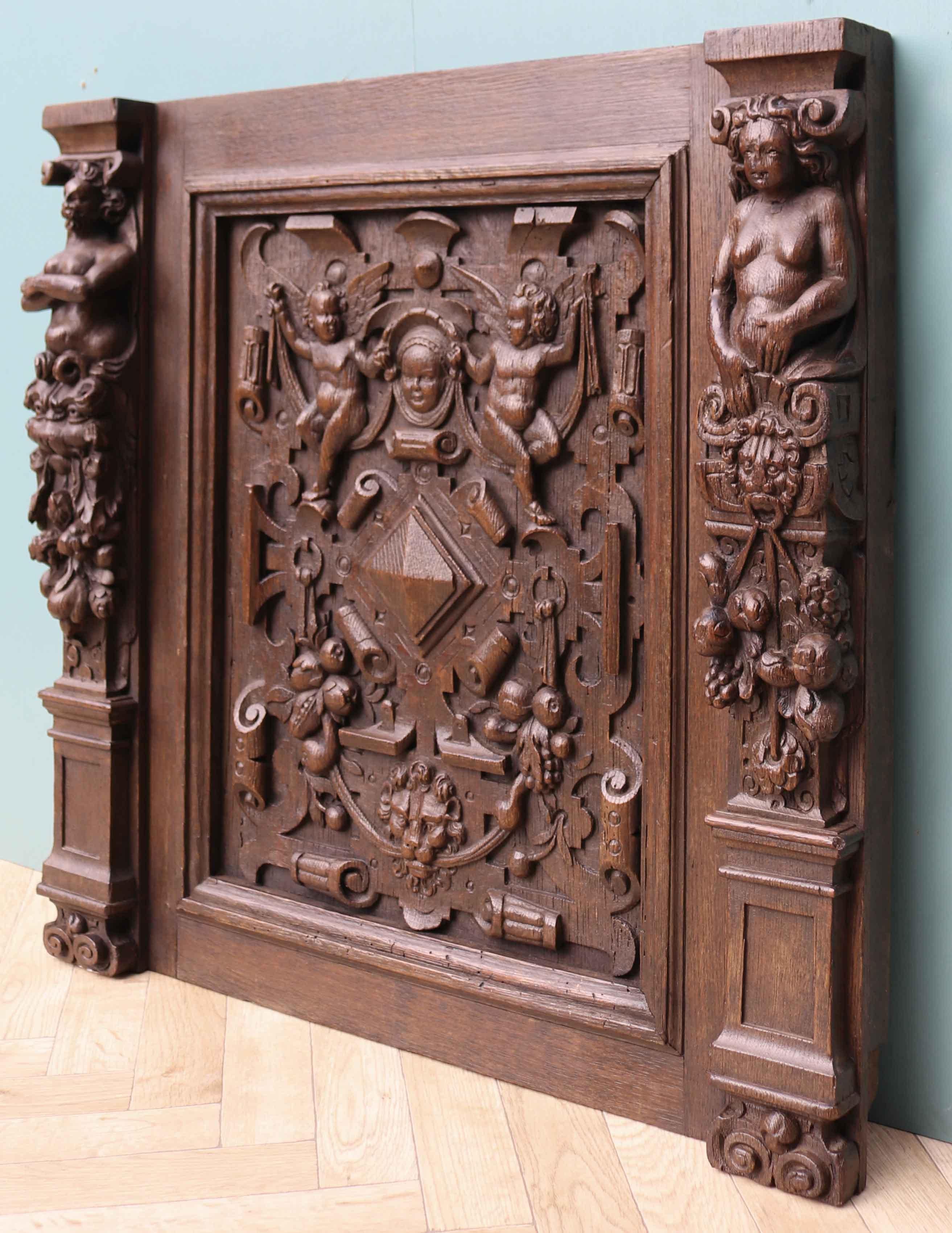 A carved oak panel featuring Caryatids and Putti. Originally from Silwood Park, Ascot.