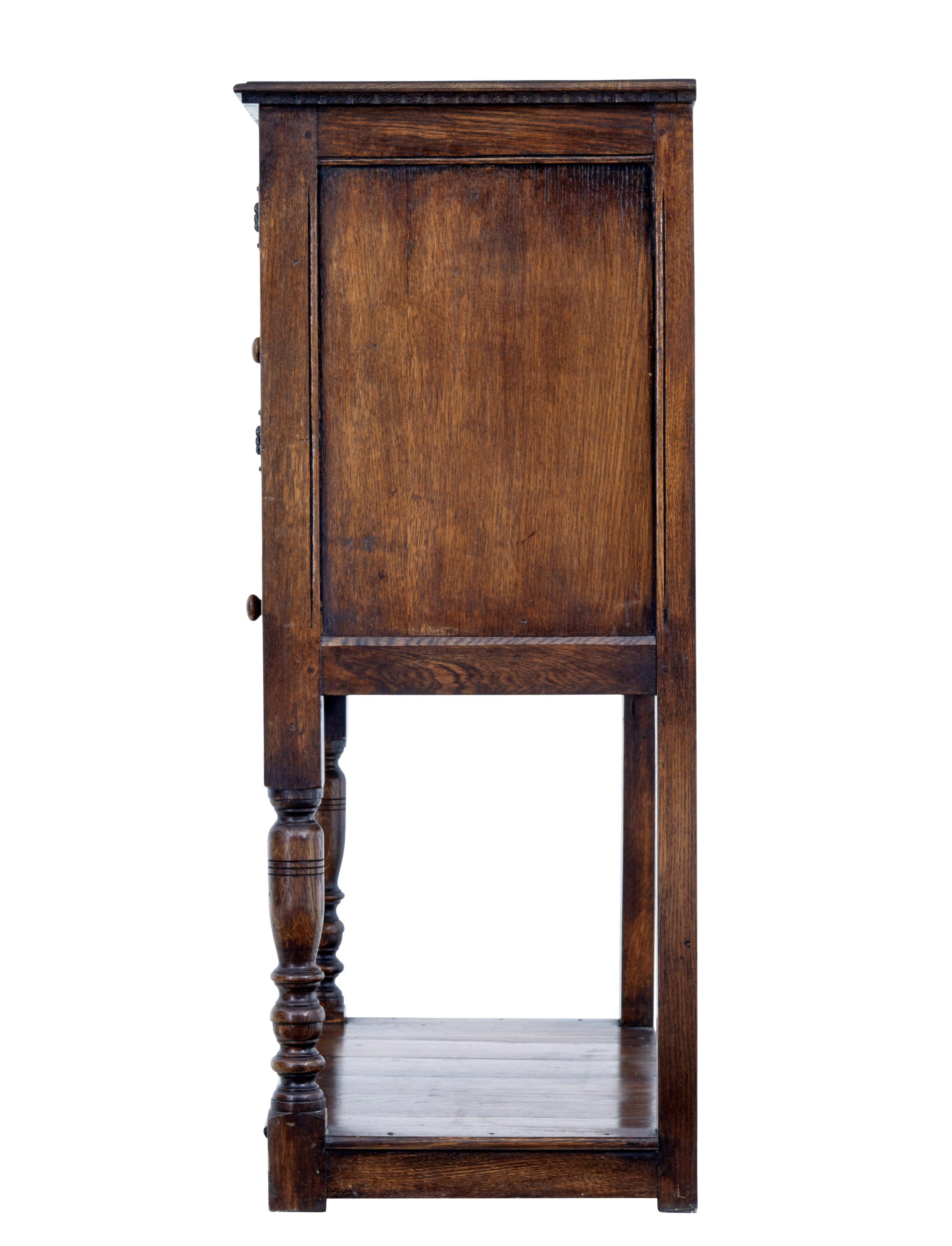 Carved oak gothic revival cupboard 1