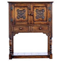 Carved oak gothic revival cupboard