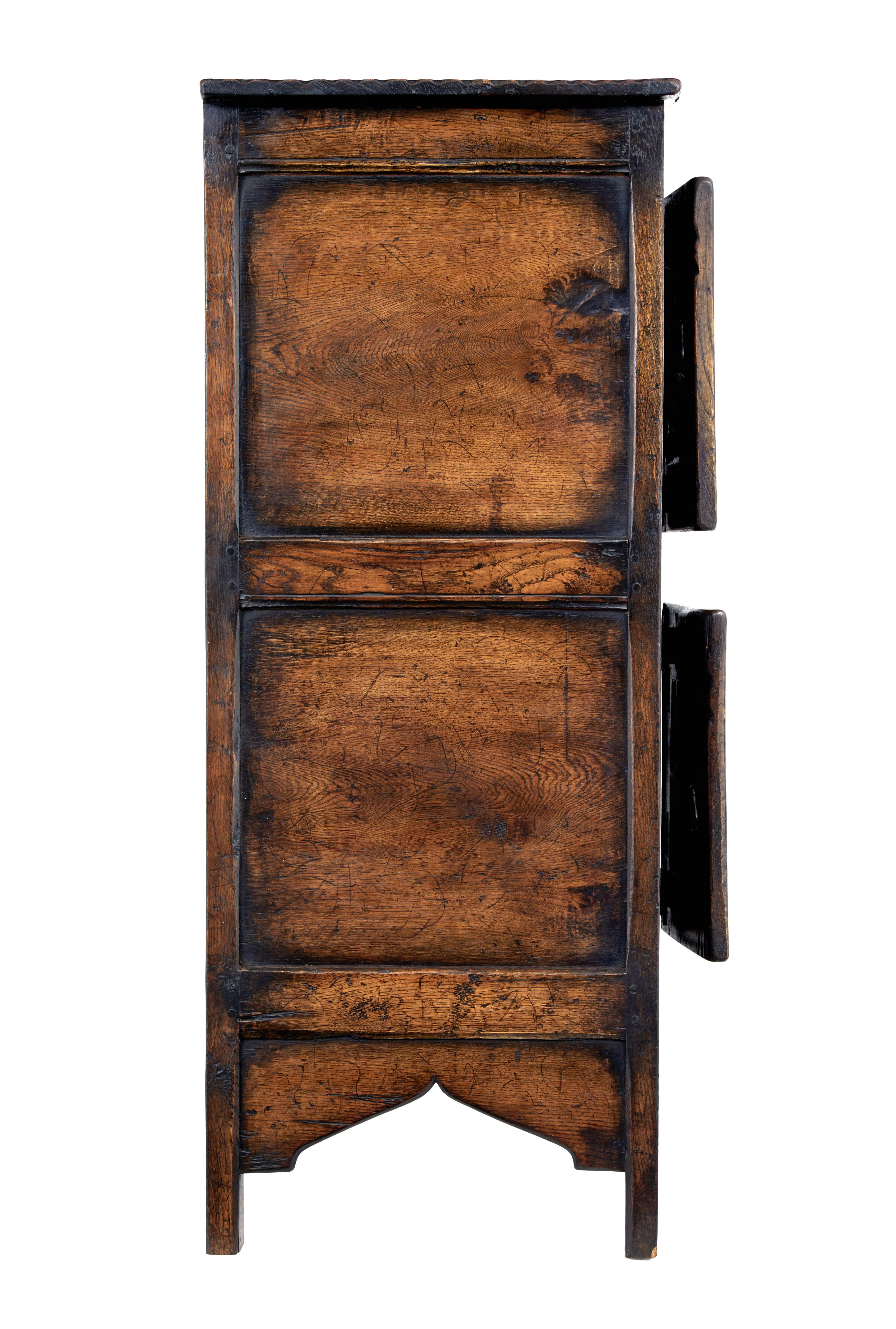 20th Century Carved oak gothic revival food cupboard