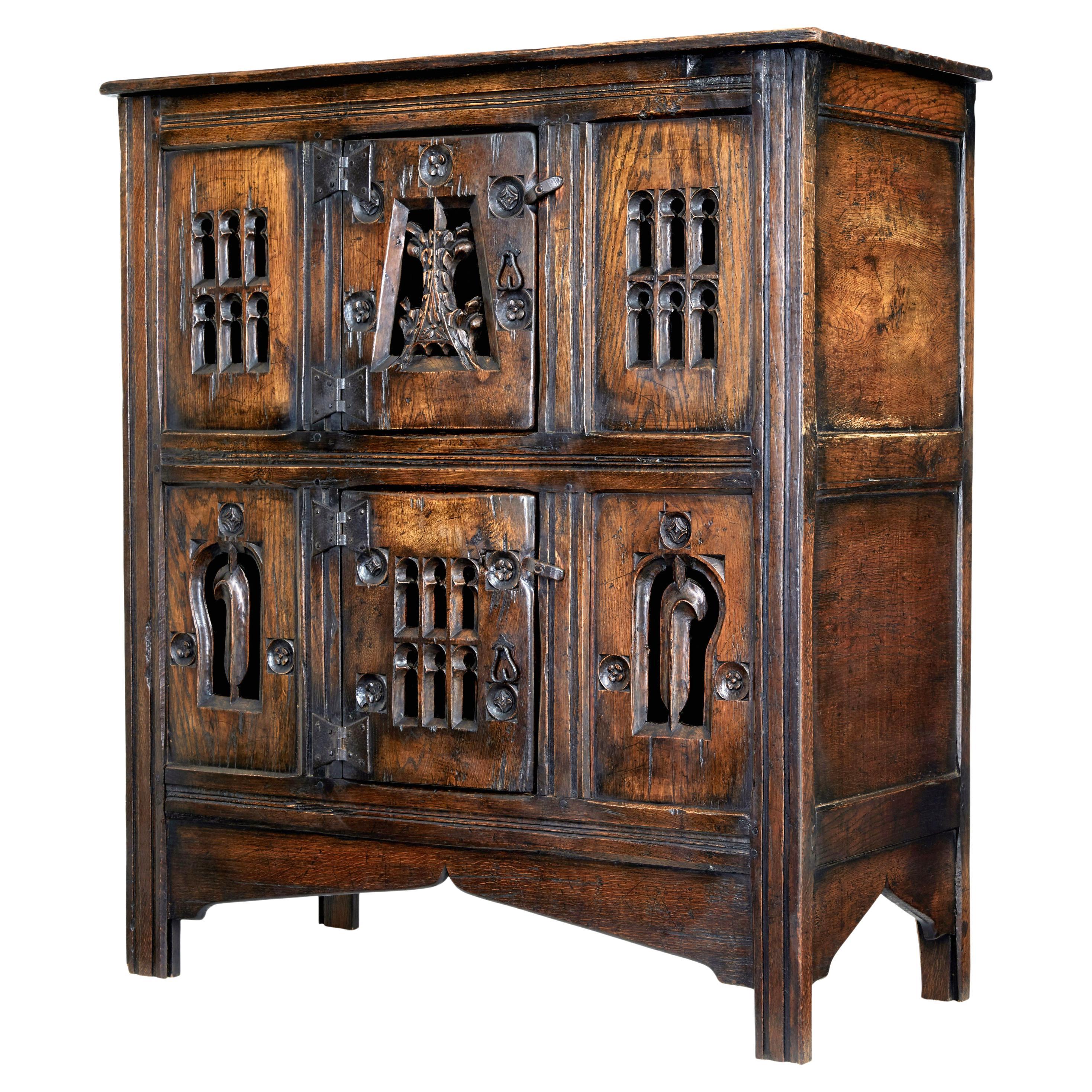 Carved oak gothic revival food cupboard For Sale