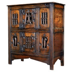 Carved oak gothic revival food cupboard