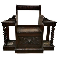 Antique Carved Oak Green Man Hall Settle, with Sick Stands