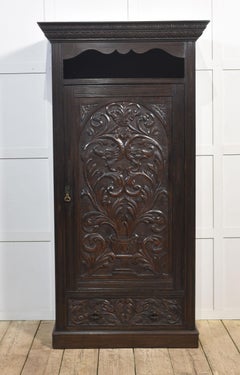Carved oak hall robe