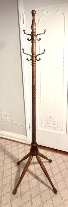 Carved Oak Hall Tree with Four Leg Base Spiraled Body and 9 Coat Hooks