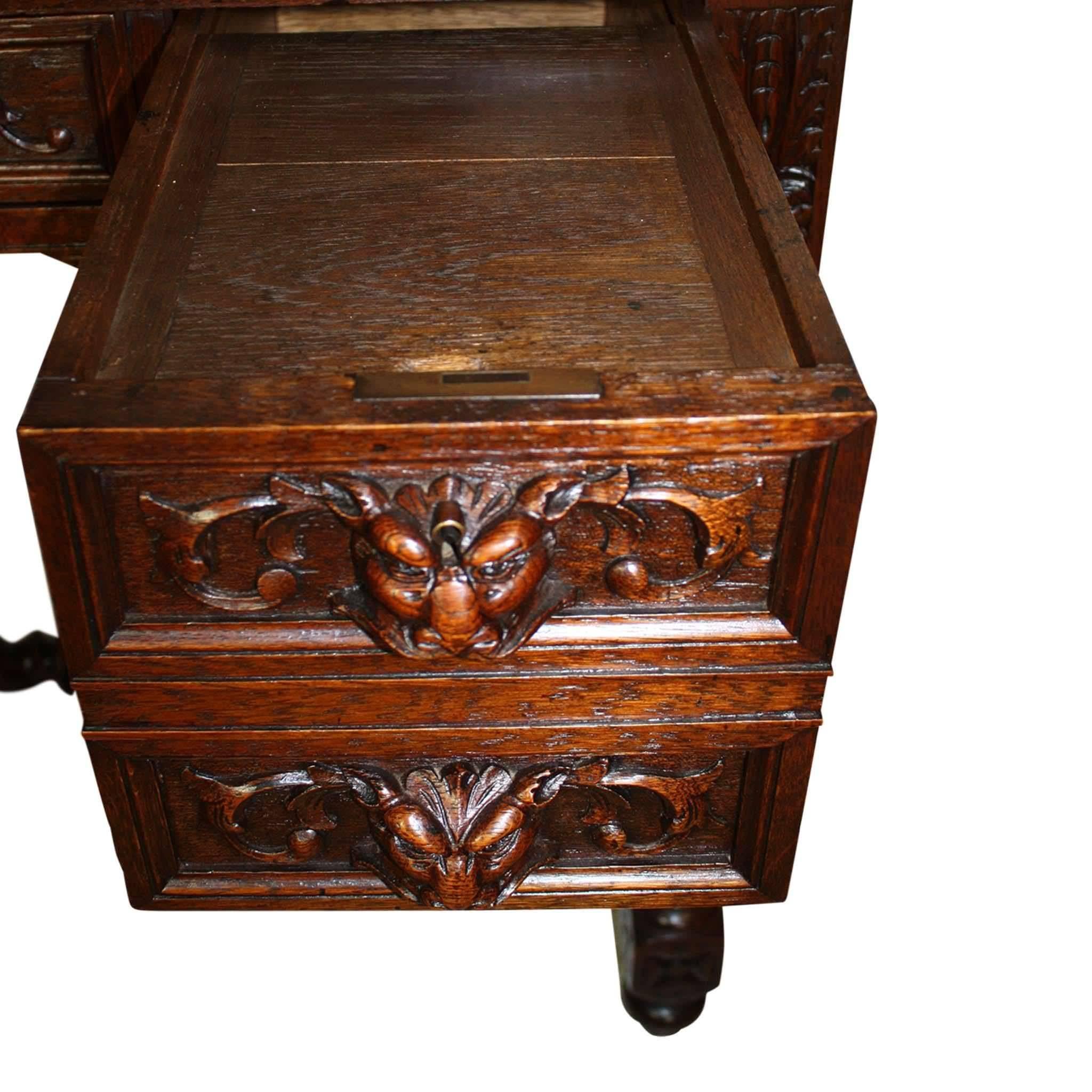 European Carved Oak Hunt Desk with Green Man Drawer Pulls, circa 1890