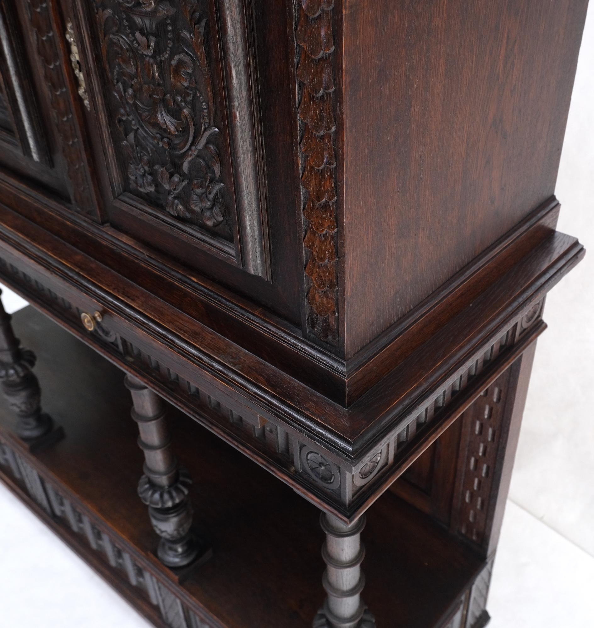 Carved Oak Jacobean style 3 doors drawers server credenza cabinet cupboard mint.
Beautiful turned solid oak supports.
