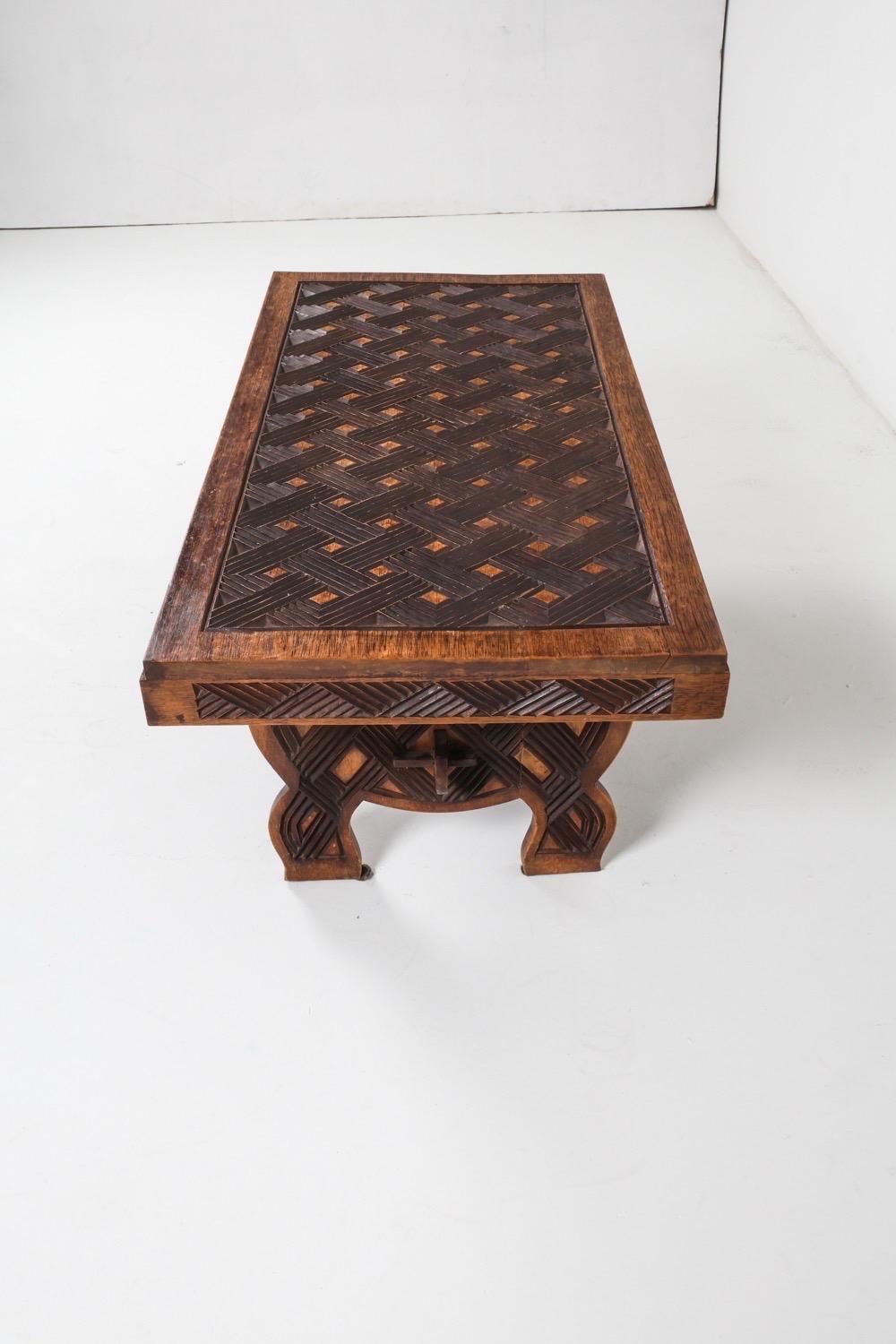 Gorgeous vintage coffee table with hand carved detail. A great addition to add texture and dimension to your space!