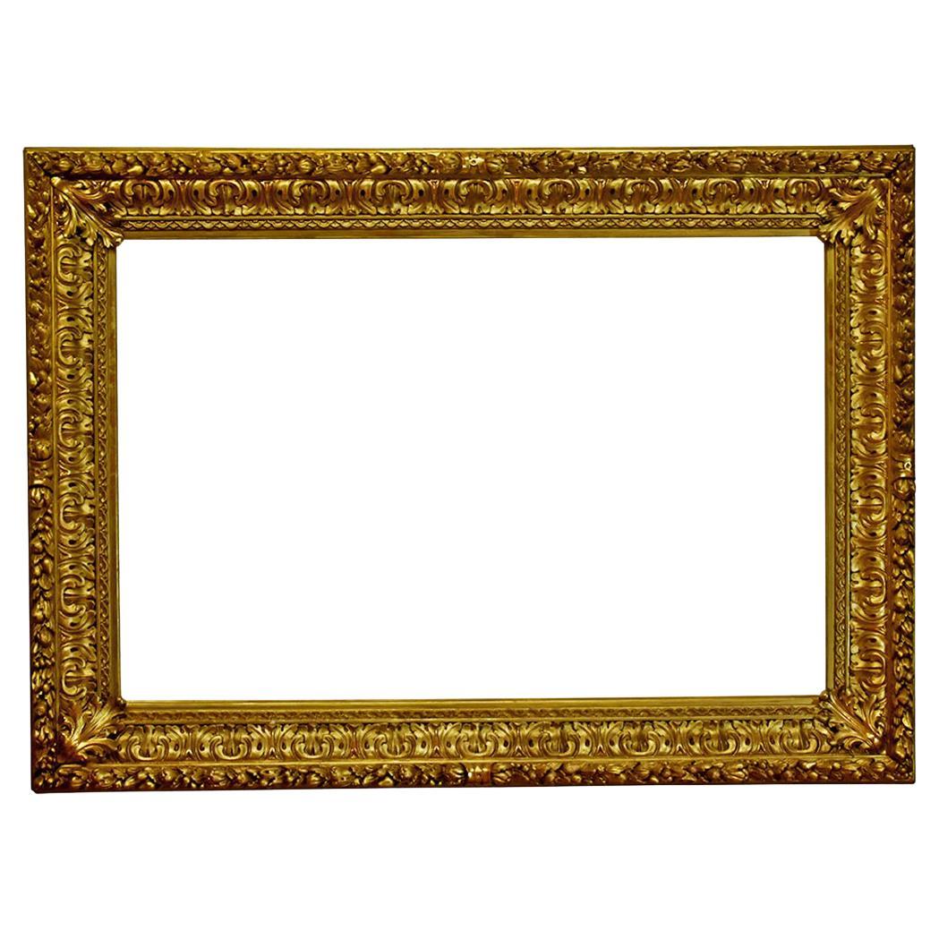 Italian 34x52 Baroque Carved Gold Leaf Picture Frame with Oak Motif circa 1860