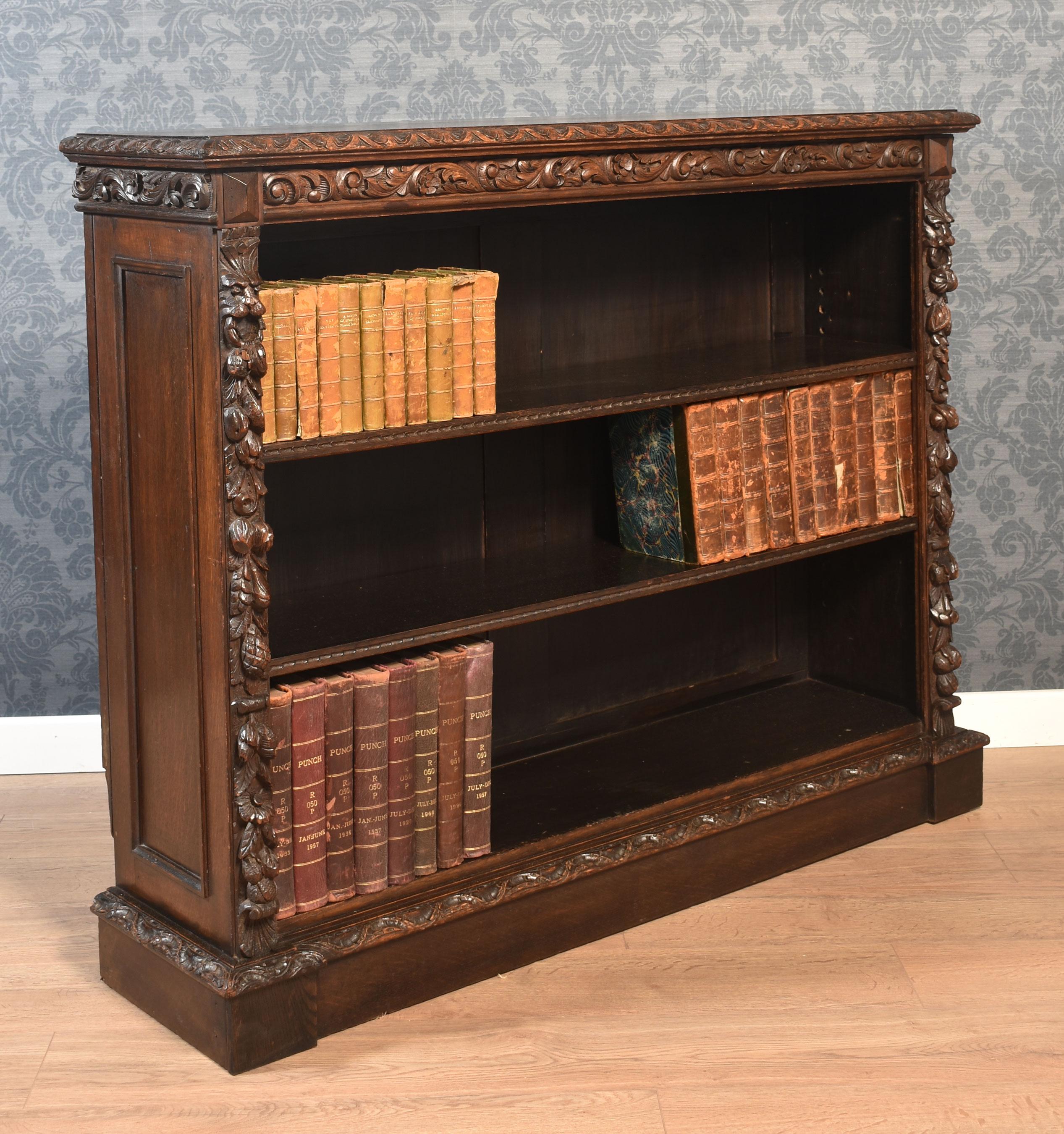 Carved oak open bookcase For Sale 7