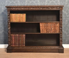 Carved oak open bookcase