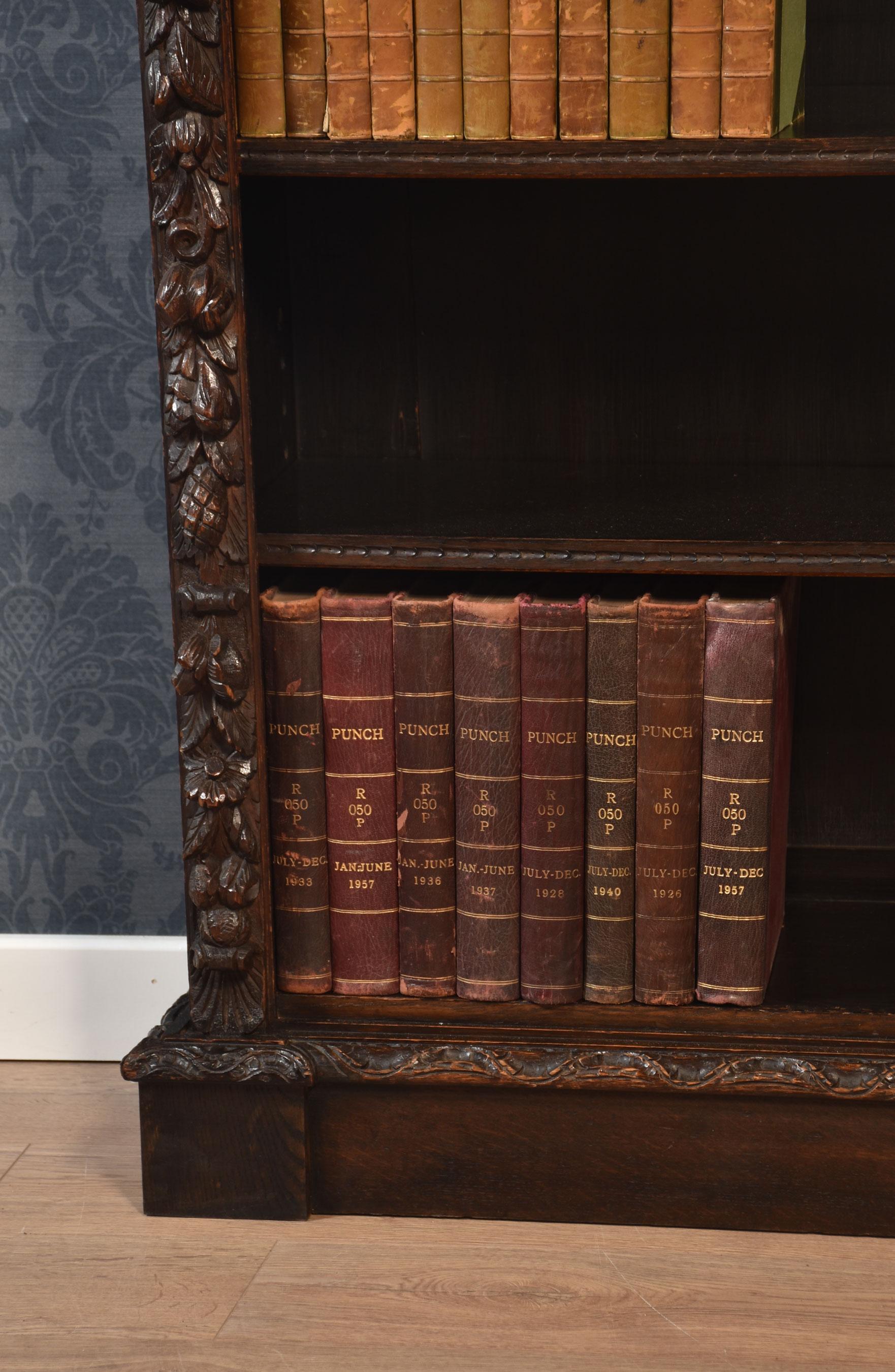 20th Century Carved oak open bookcase For Sale