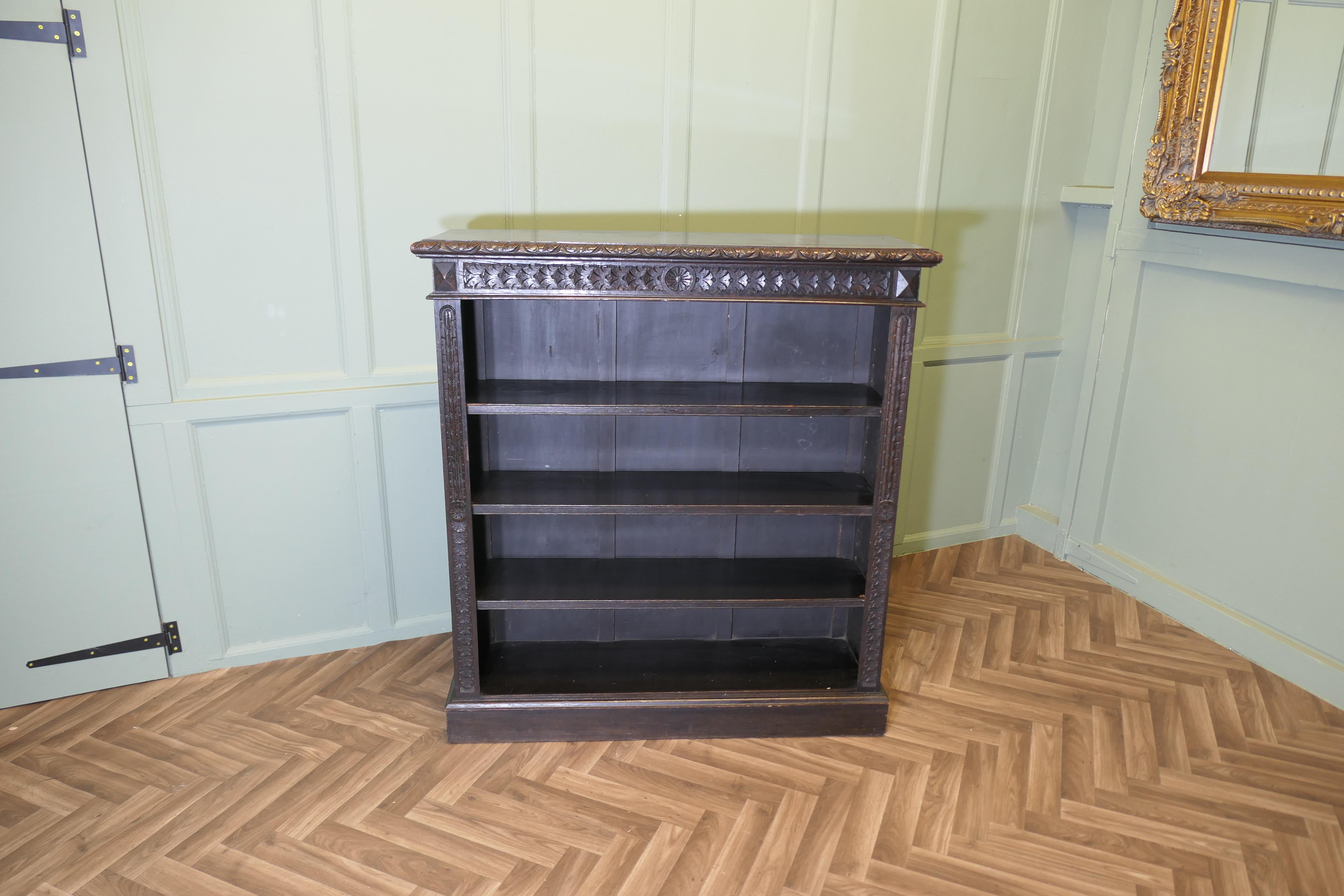 Carved Oak Open Bookcase.
The bookcase is good quality, with attractive carving on the front

The bookcase is in good original condition and the shelves are adjustable 
This excellent piece of Oak Furniture would work very well in your Living room,