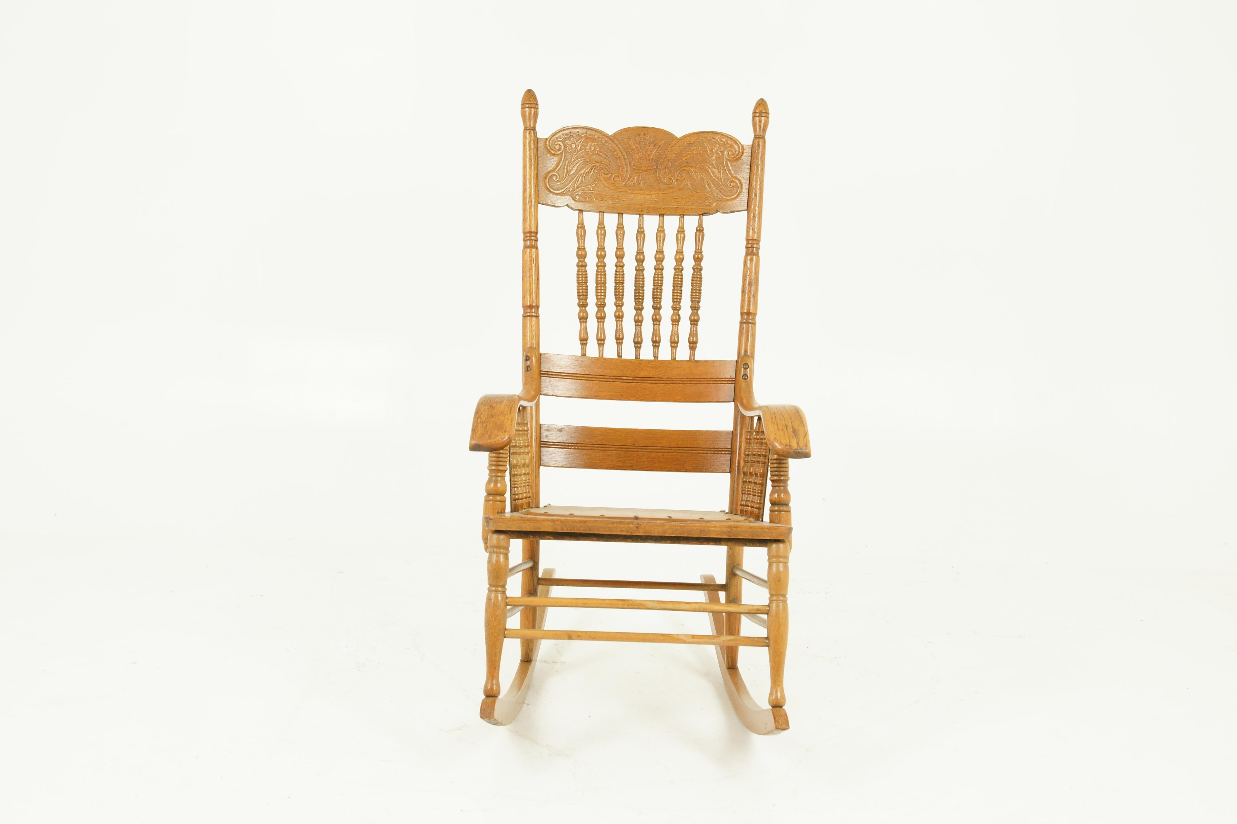 Antique rocking chair, spindle pressed back, carved oak, America, 1910, antique furniture, BCon2

America, 1910
Solid oak construction
Tall turned supports to the back
Carved pressed back to the top
Seven turned spindles below
Outswept bentwood