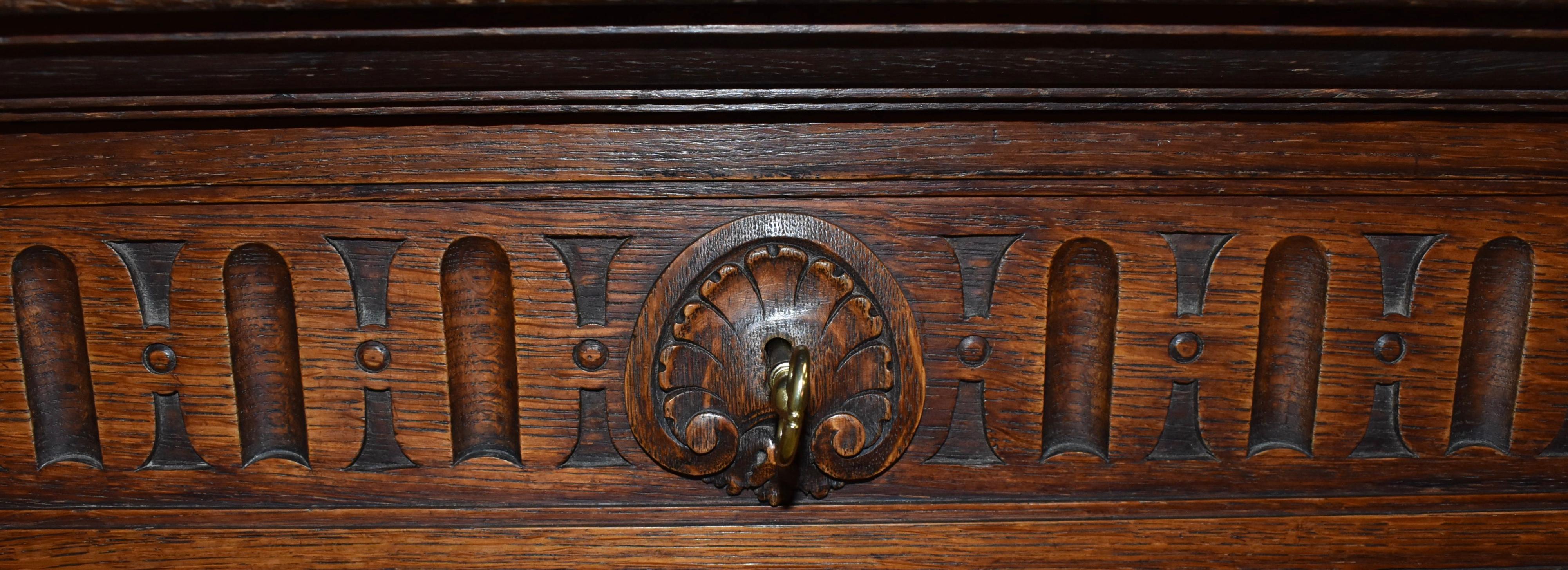 Carved Oak Server Buffet with Decorative Putti Copper Panel For Sale 4