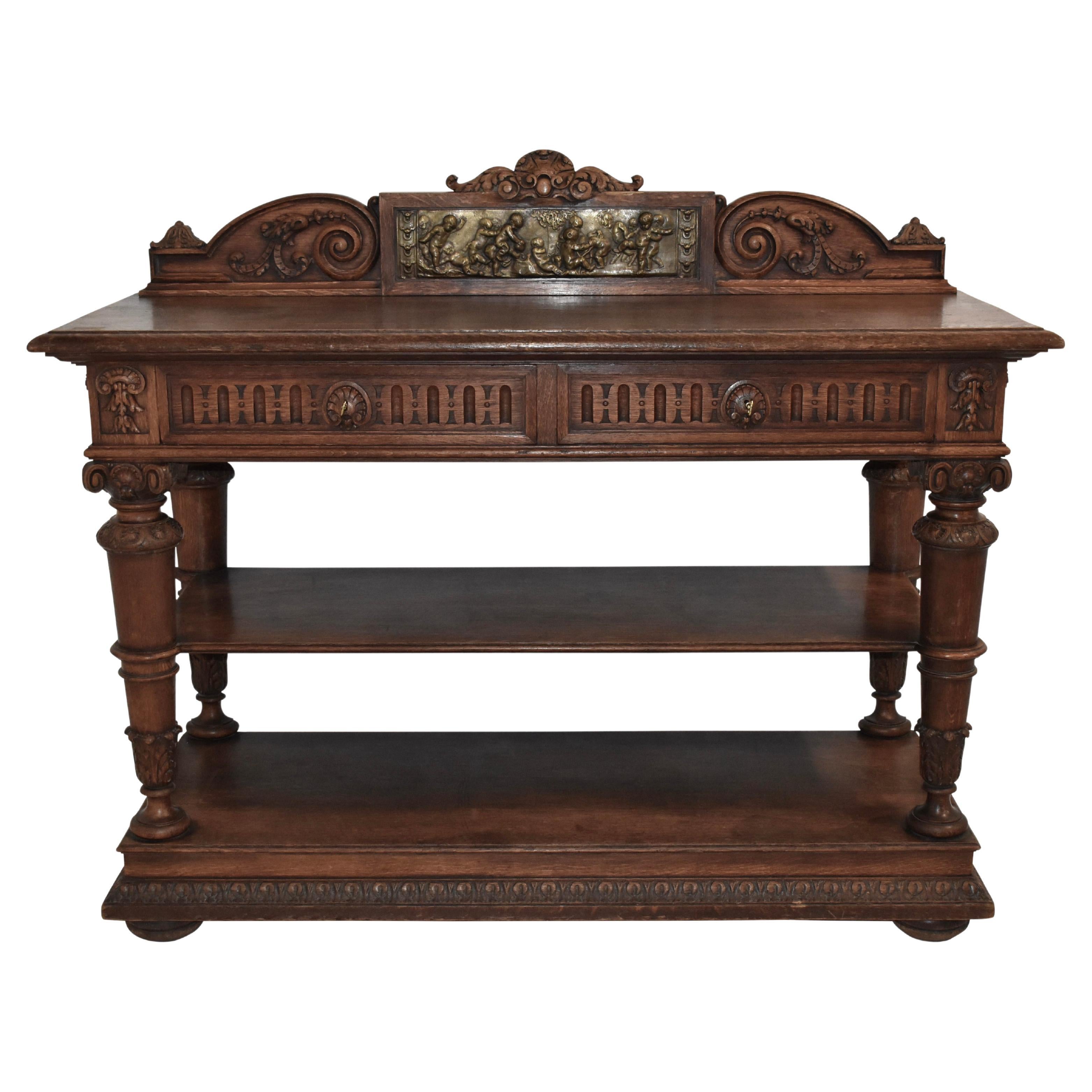 Carved Oak Server Buffet with Decorative Putti Copper Panel For Sale