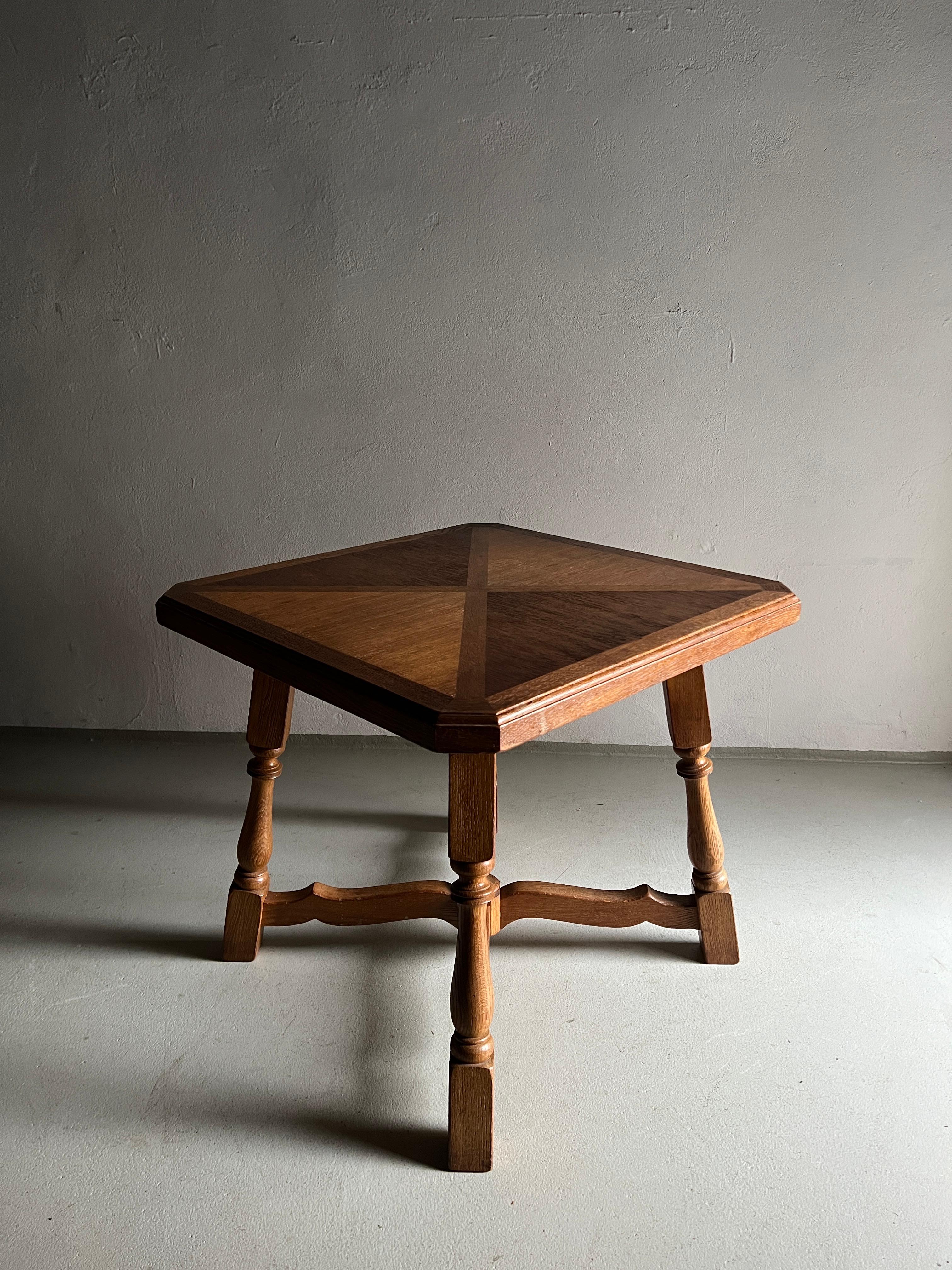 Vintage solid oak lamp table with a square tabletop.

Additional information:
Country of manufacture: The Netherlands
Period: Design period: 1970s
Dimensions: 72.5 W x 72.5 D x 67 H cm
Condition: Good vintage condition (some imperfections on the