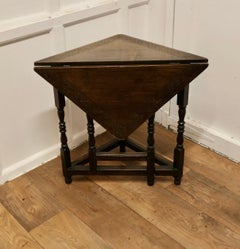 Carved Oak Triangular Gate Leg Side Table