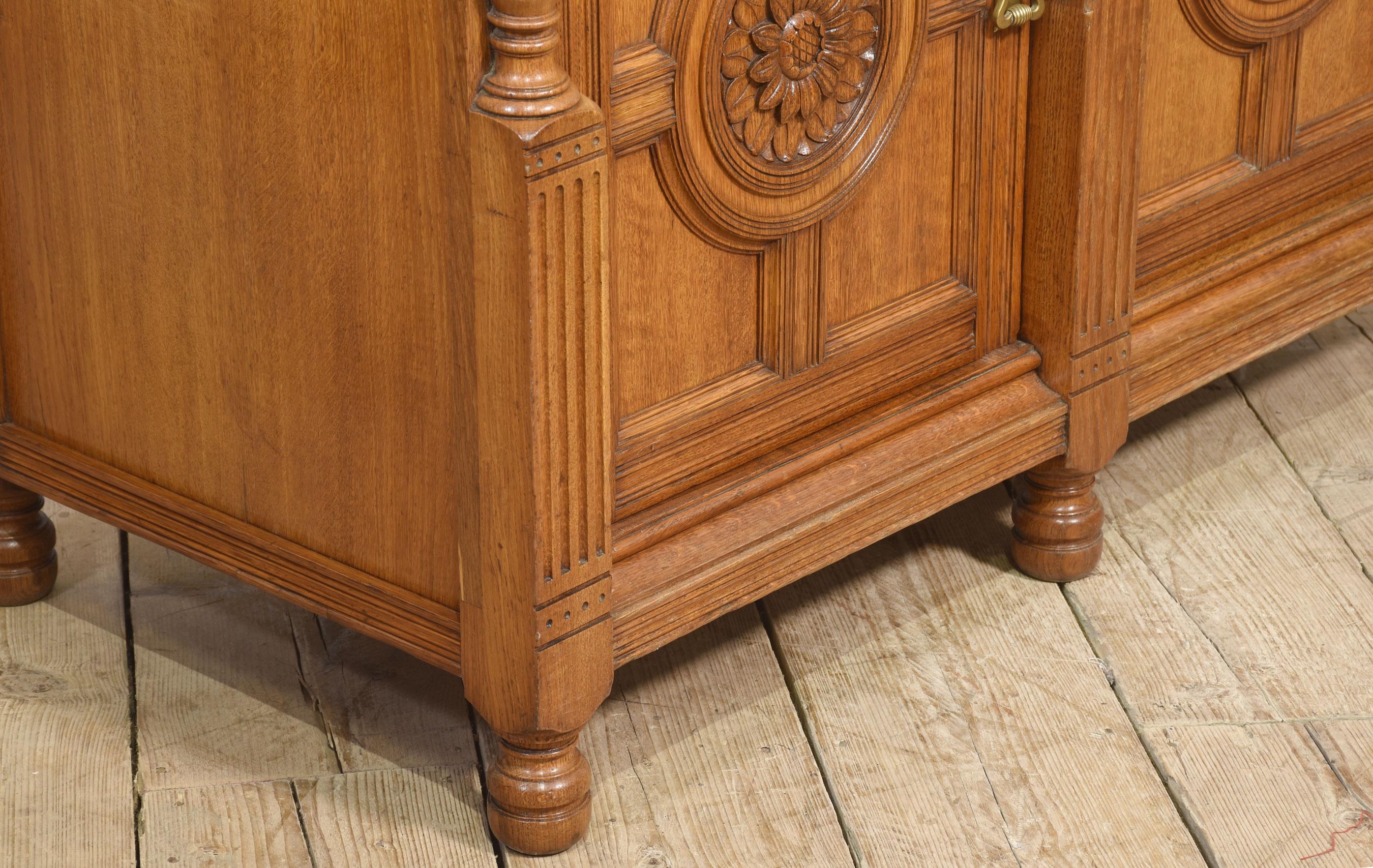 Carved oak two door sideboard by Maple and Co For Sale 5