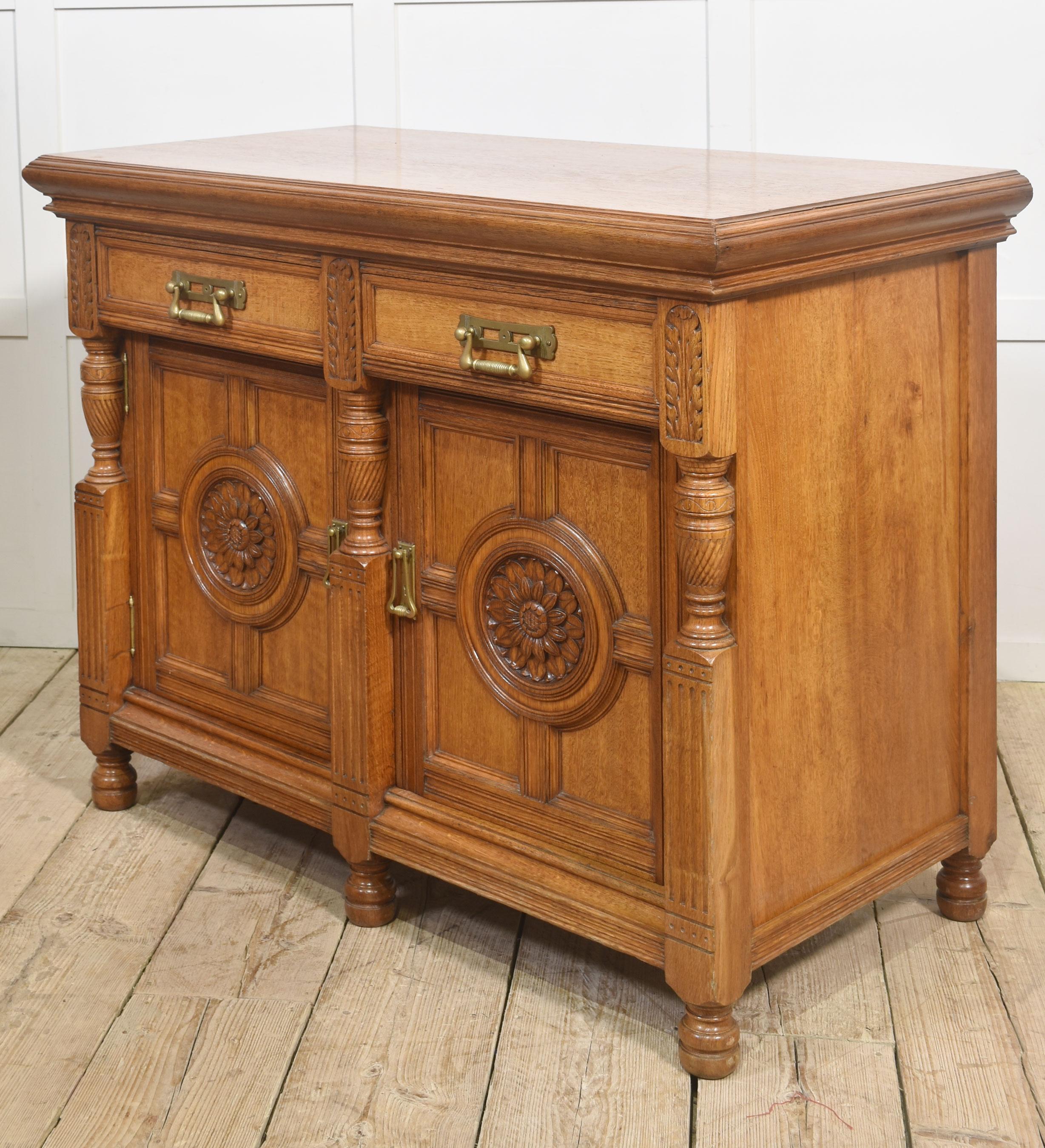 Carved oak two door sideboard by Maple and Co For Sale 8