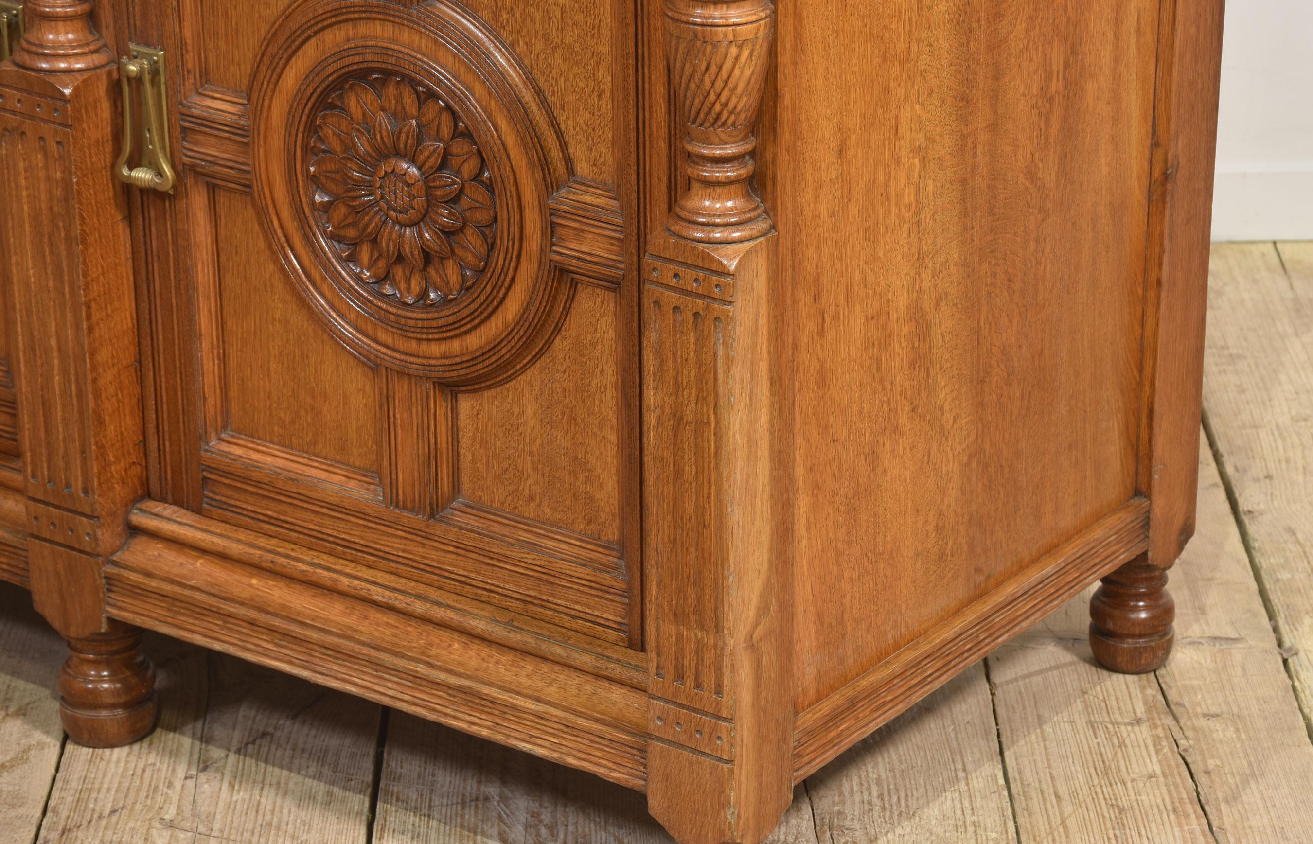 Carved oak two door sideboard by Maple and Co For Sale 9