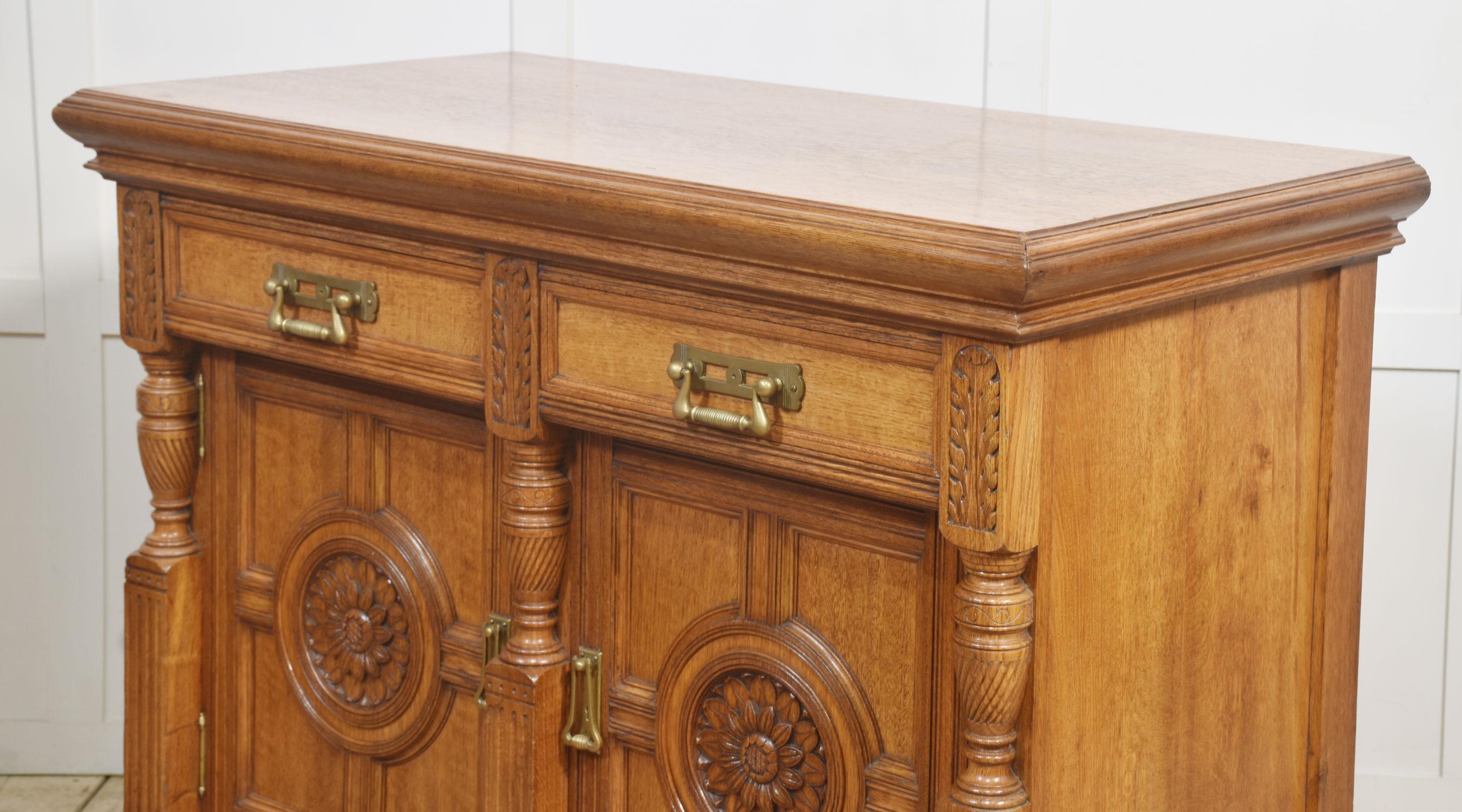 Carved oak two door sideboard by Maple and Co For Sale 10