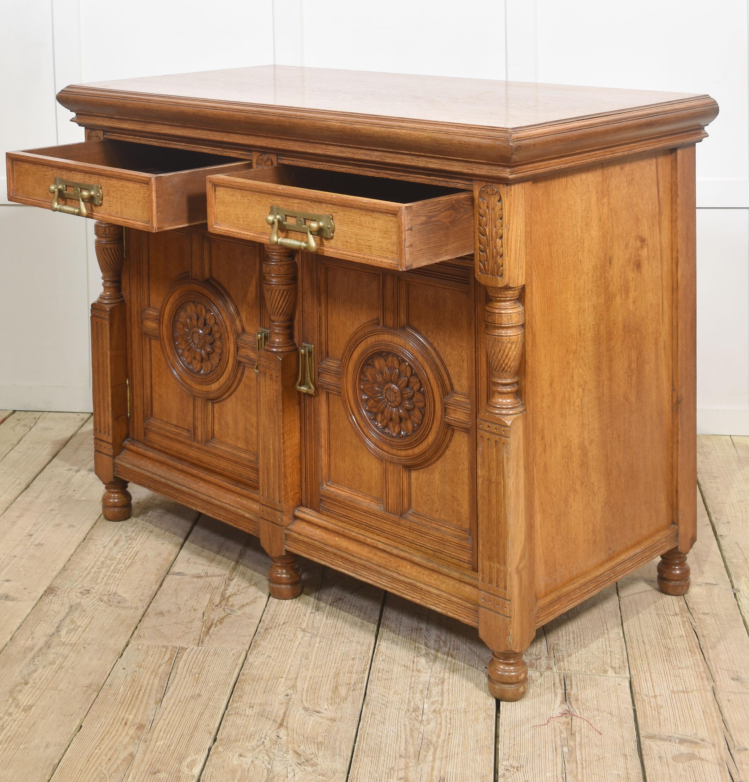 Carved oak two door sideboard by Maple and Co For Sale 12