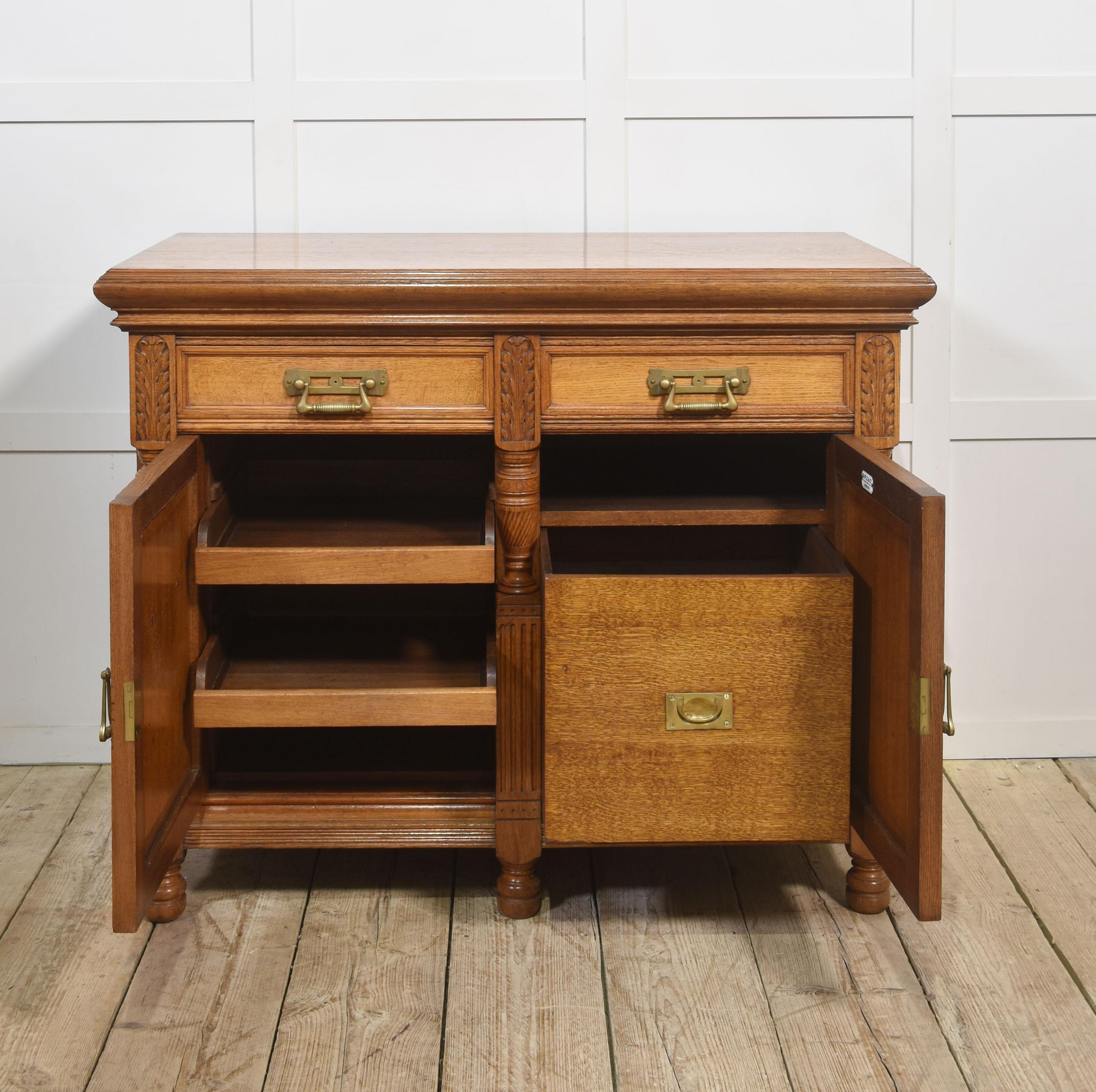 Carved oak two door sideboard by Maple and Co For Sale 2
