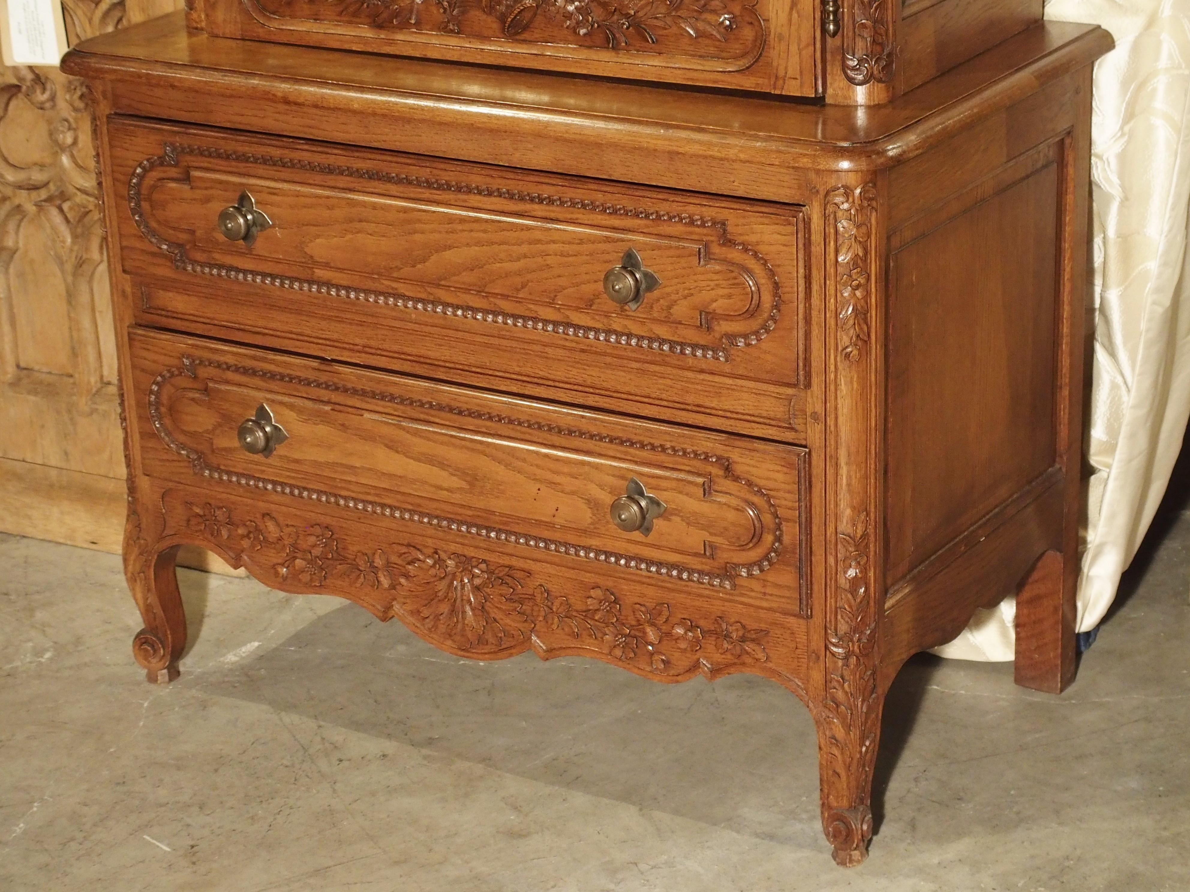 This example of antique furniture has all of the design elements that are typical of pieces from Normandy. However, the combination of a bonnetiere and commode as one piece, is very unusual. During the 18th and 19th centuries, they were almost