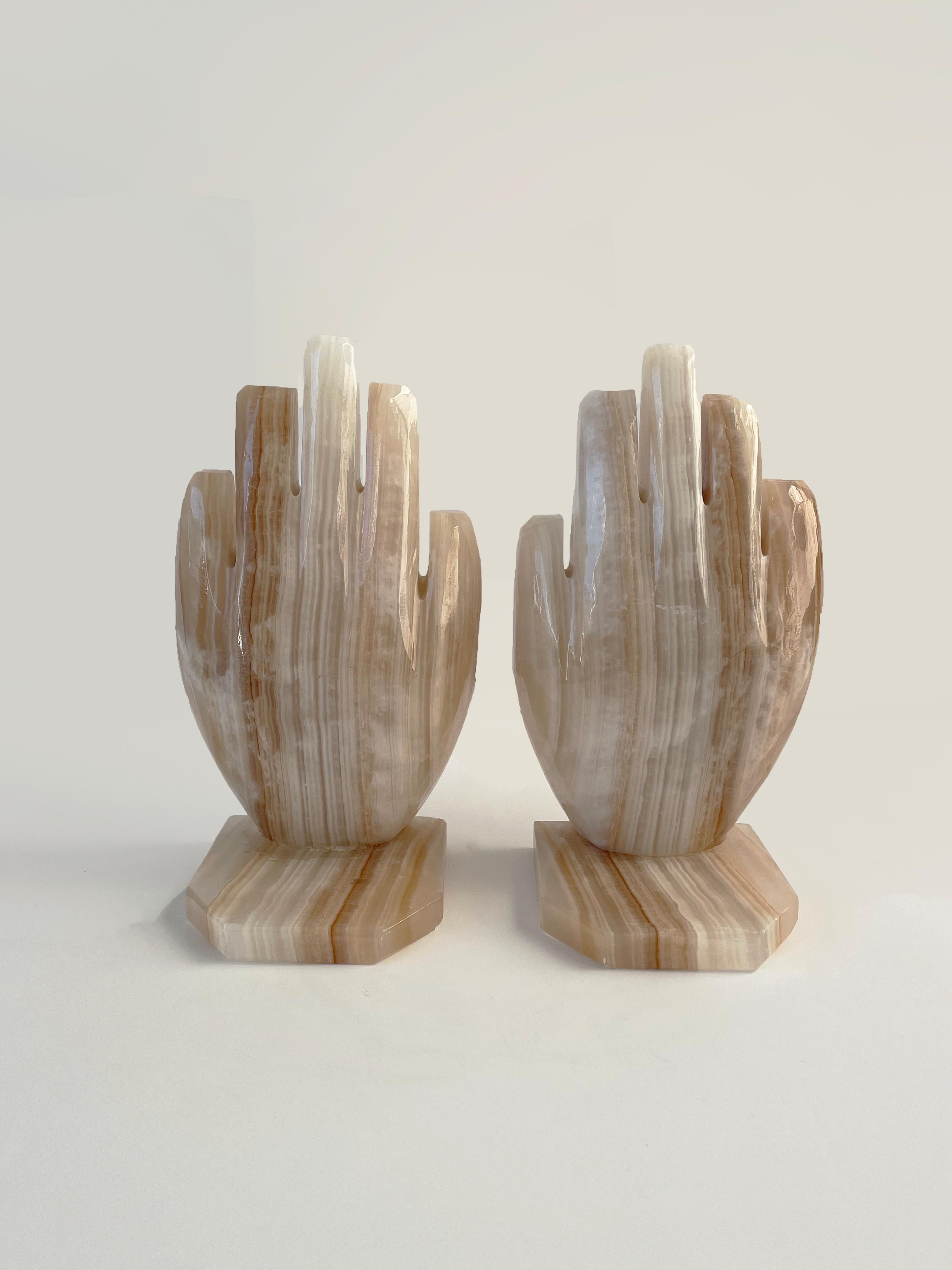 Nearly perfect carved onyx hand shaped bookends. Each measures 6.5 x 3.5 x 4